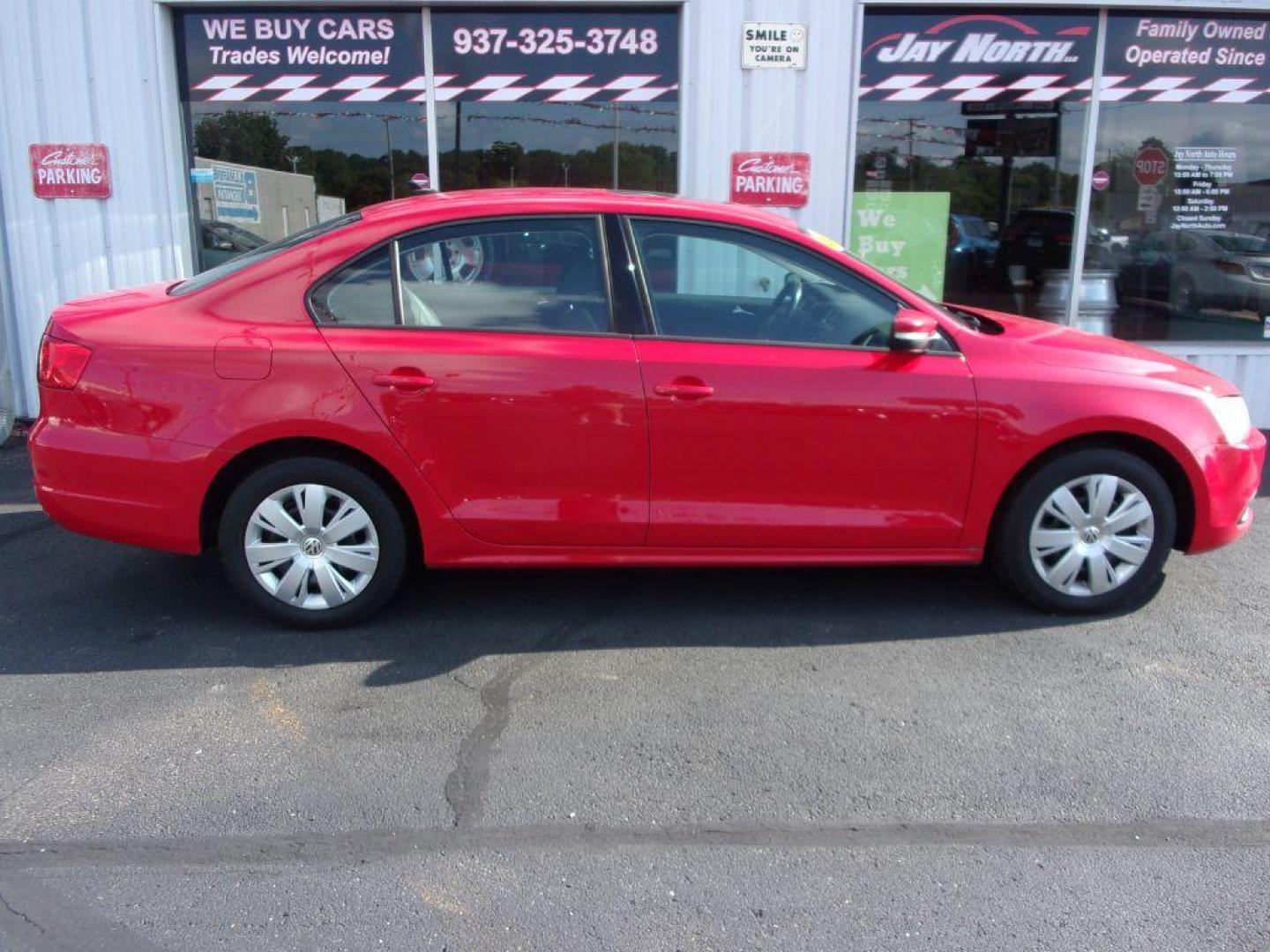 2011 RED VOLKSWAGEN JETTA SE (3VWDX7AJ2BM) with an 2.5L engine, Automatic transmission, located at 501 E. Columbia St., Springfield, OH, 45503, (800) 262-7122, 39.925262, -83.801796 - ***Clean Carfax***SE***Heated Leather Seating***Sunroof***Serviced and Detailed*** Navigation *** Jay North Auto has offered hand picked vehicles since 1965! Our customer's enjoy a NO pressure buying experience with a small town feel. All of our vehicles get fully inspected and detailed. We are - Photo#0