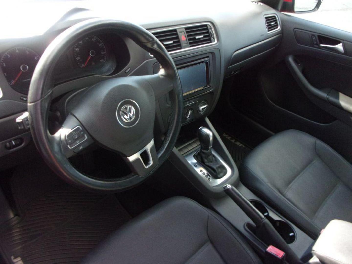 2011 RED VOLKSWAGEN JETTA SE (3VWDX7AJ2BM) with an 2.5L engine, Automatic transmission, located at 501 E. Columbia St., Springfield, OH, 45503, (800) 262-7122, 39.925262, -83.801796 - ***Clean Carfax***SE***Heated Leather Seating***Sunroof***Serviced and Detailed*** Navigation *** Jay North Auto has offered hand picked vehicles since 1965! Our customer's enjoy a NO pressure buying experience with a small town feel. All of our vehicles get fully inspected and detailed. We are - Photo#10