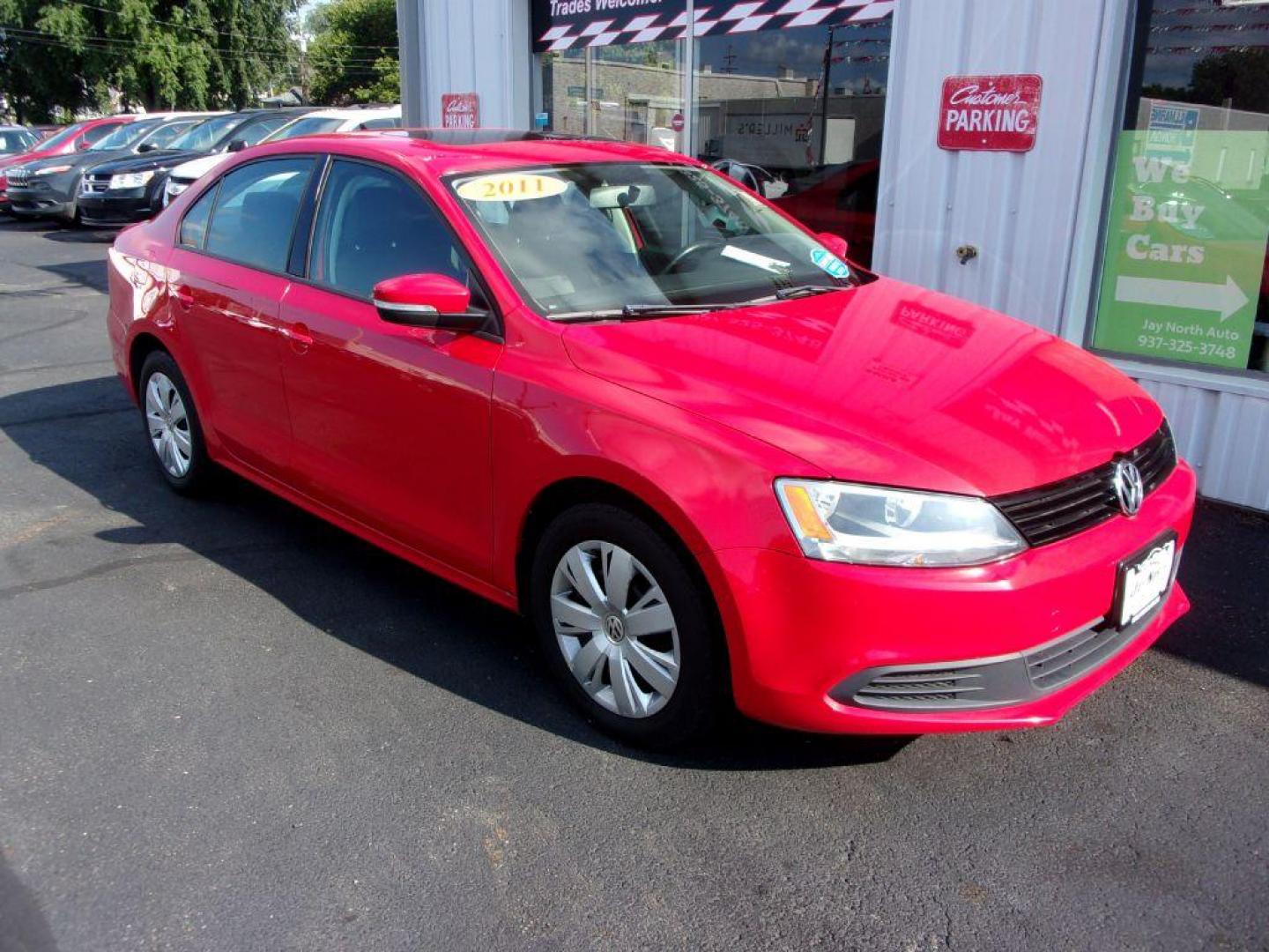 2011 RED VOLKSWAGEN JETTA SE (3VWDX7AJ2BM) with an 2.5L engine, Automatic transmission, located at 501 E. Columbia St., Springfield, OH, 45503, (800) 262-7122, 39.925262, -83.801796 - ***Clean Carfax***SE***Heated Leather Seating***Sunroof***Serviced and Detailed*** Navigation *** Jay North Auto has offered hand picked vehicles since 1965! Our customer's enjoy a NO pressure buying experience with a small town feel. All of our vehicles get fully inspected and detailed. We are - Photo#1