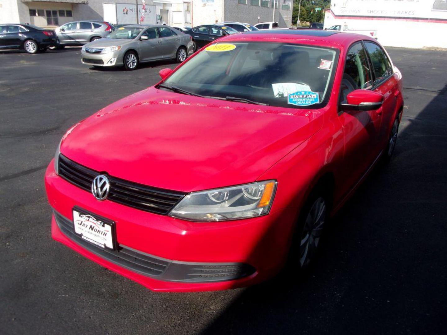 2011 RED VOLKSWAGEN JETTA SE (3VWDX7AJ2BM) with an 2.5L engine, Automatic transmission, located at 501 E. Columbia St., Springfield, OH, 45503, (800) 262-7122, 39.925262, -83.801796 - ***Clean Carfax***SE***Heated Leather Seating***Sunroof***Serviced and Detailed*** Navigation *** Jay North Auto has offered hand picked vehicles since 1965! Our customer's enjoy a NO pressure buying experience with a small town feel. All of our vehicles get fully inspected and detailed. We are - Photo#3