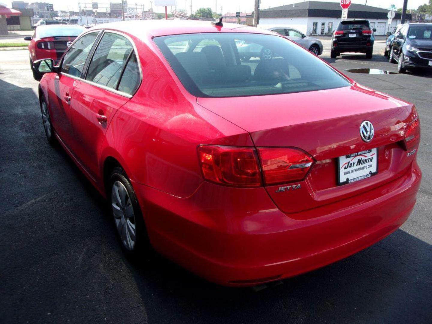 2011 RED VOLKSWAGEN JETTA SE (3VWDX7AJ2BM) with an 2.5L engine, Automatic transmission, located at 501 E. Columbia St., Springfield, OH, 45503, (800) 262-7122, 39.925262, -83.801796 - ***Clean Carfax***SE***Heated Leather Seating***Sunroof***Serviced and Detailed*** Navigation *** Jay North Auto has offered hand picked vehicles since 1965! Our customer's enjoy a NO pressure buying experience with a small town feel. All of our vehicles get fully inspected and detailed. We are - Photo#4