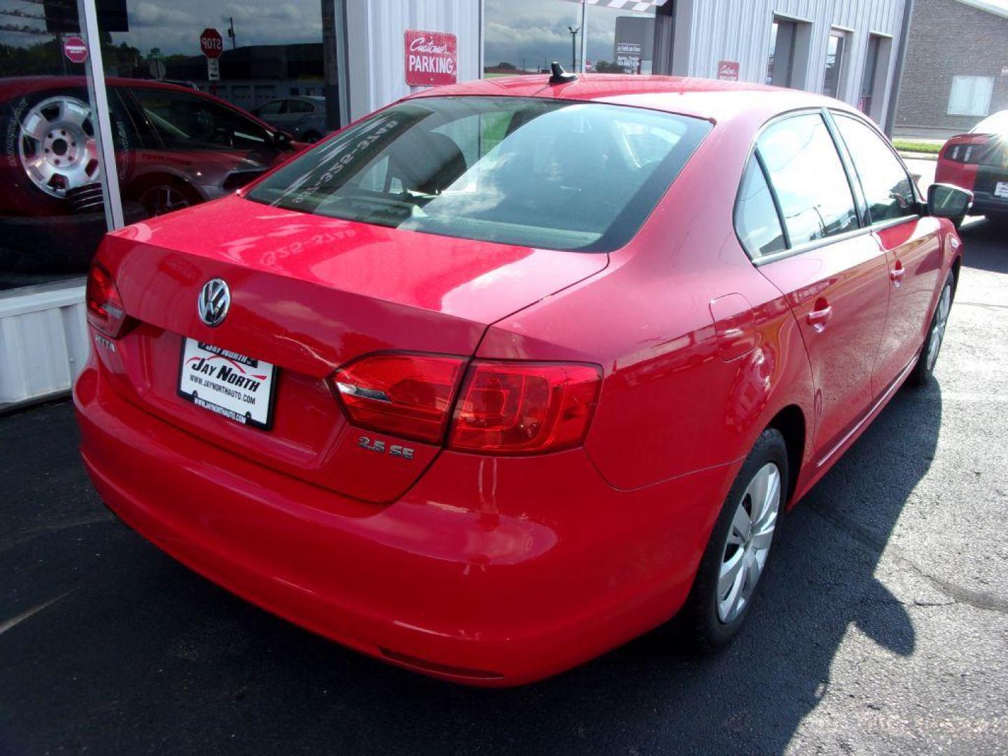 2011 RED VOLKSWAGEN JETTA SE (3VWDX7AJ2BM) with an 2.5L engine, Automatic transmission, located at 501 E. Columbia St., Springfield, OH, 45503, (800) 262-7122, 39.925262, -83.801796 - ***Clean Carfax***SE***Heated Leather Seating***Sunroof***Serviced and Detailed*** Navigation *** Jay North Auto has offered hand picked vehicles since 1965! Our customer's enjoy a NO pressure buying experience with a small town feel. All of our vehicles get fully inspected and detailed. We are - Photo#5