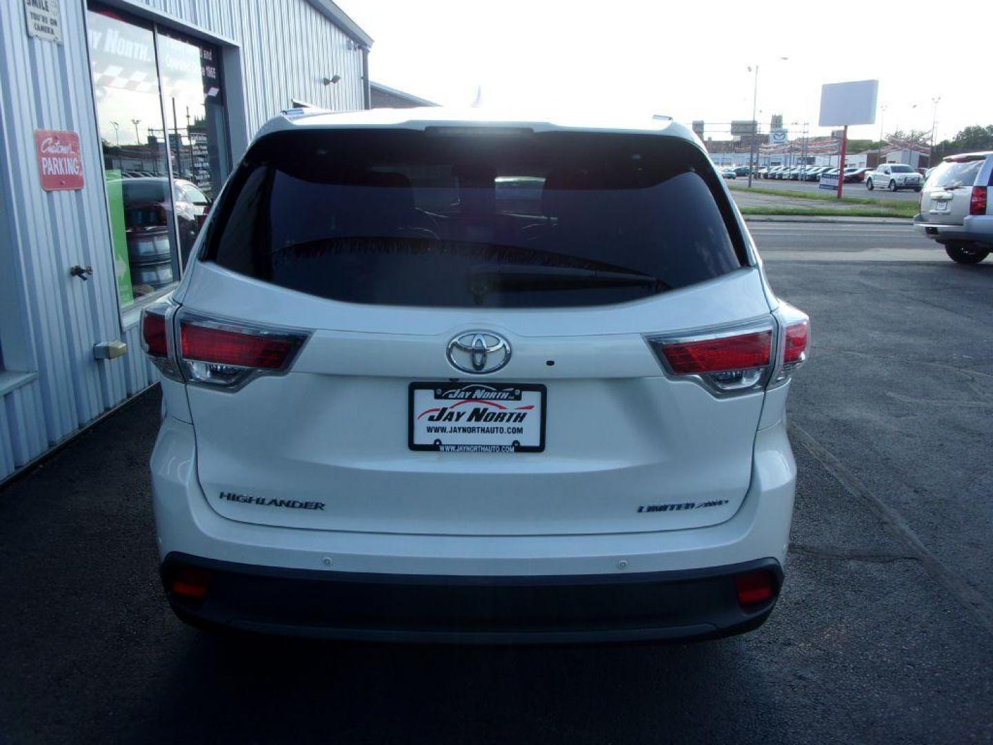 2015 WHITE TOYOTA HIGHLANDER LIMITED (5TDDKRFH4FS) with an 3.5L engine, Automatic transmission, located at 501 E. Columbia St., Springfield, OH, 45503, (800) 262-7122, 39.925262, -83.801796 - *** Limited *** Loaded *** JBL Audio w/ Touchscreen and Navigation *** Heated and Cooled Leather *** Back Up Camera *** Moonroof *** 3rd Row Seating *** 2nd Row Captain seats *** AWD *** V6 *** Serviced and Detailed *** BSM not working *** Good Service History *** Drives Great *** Jay North Auto - Photo#6