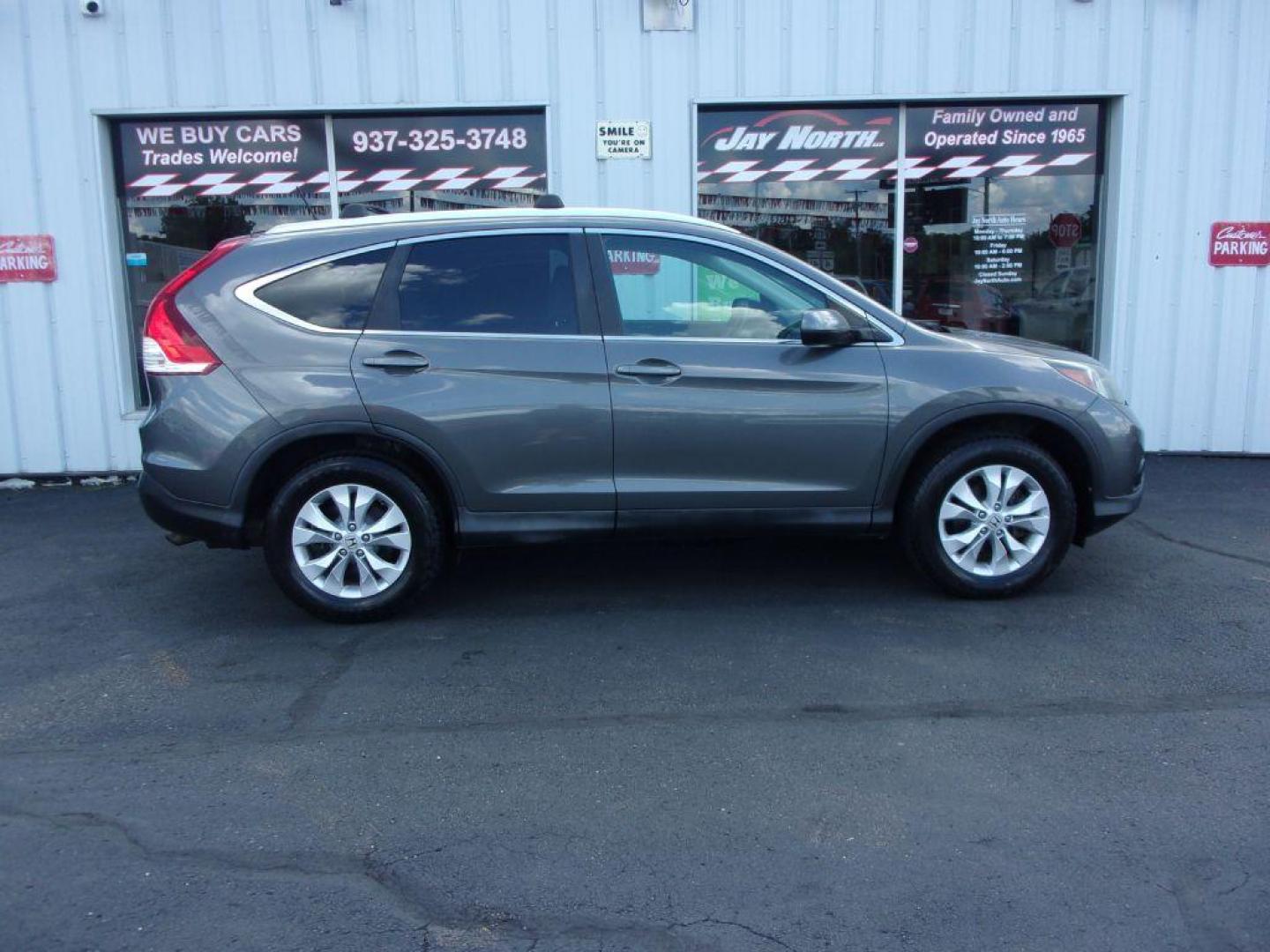 2014 GRAY HONDA CR-V EXL (2HKRM4H78EH) with an 2.4L engine, Automatic transmission, located at 501 E. Columbia St., Springfield, OH, 45503, (800) 262-7122, 39.925262, -83.801796 - ***1-Owner***Clean Carfax***EXL***AWD***New Tires***Heated Leather Seating***Sunroof***Serviced and Detailed*** Jay North Auto has offered hand picked vehicles since 1965! Our customer's enjoy a NO pressure buying experience with a small town feel. All of our vehicles get fully inspected and det - Photo#0