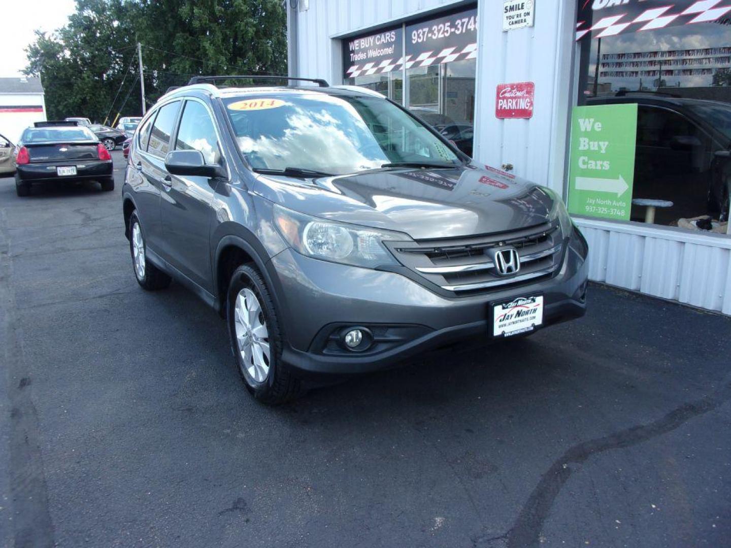 2014 GRAY HONDA CR-V EXL (2HKRM4H78EH) with an 2.4L engine, Automatic transmission, located at 501 E. Columbia St., Springfield, OH, 45503, (800) 262-7122, 39.925262, -83.801796 - ***1-Owner***Clean Carfax***EXL***AWD***New Tires***Heated Leather Seating***Sunroof***Serviced and Detailed*** Jay North Auto has offered hand picked vehicles since 1965! Our customer's enjoy a NO pressure buying experience with a small town feel. All of our vehicles get fully inspected and det - Photo#2