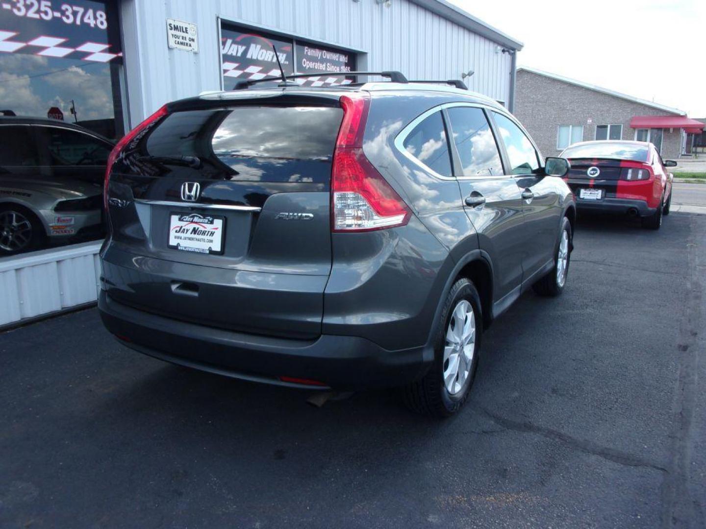 2014 GRAY HONDA CR-V EXL (2HKRM4H78EH) with an 2.4L engine, Automatic transmission, located at 501 E. Columbia St., Springfield, OH, 45503, (800) 262-7122, 39.925262, -83.801796 - ***1-Owner***Clean Carfax***EXL***AWD***New Tires***Heated Leather Seating***Sunroof***Serviced and Detailed*** Jay North Auto has offered hand picked vehicles since 1965! Our customer's enjoy a NO pressure buying experience with a small town feel. All of our vehicles get fully inspected and det - Photo#3