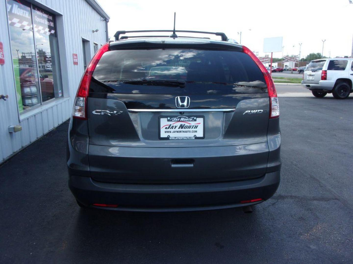 2014 GRAY HONDA CR-V EXL (2HKRM4H78EH) with an 2.4L engine, Automatic transmission, located at 501 E. Columbia St., Springfield, OH, 45503, (800) 262-7122, 39.925262, -83.801796 - ***1-Owner***Clean Carfax***EXL***AWD***New Tires***Heated Leather Seating***Sunroof***Serviced and Detailed*** Jay North Auto has offered hand picked vehicles since 1965! Our customer's enjoy a NO pressure buying experience with a small town feel. All of our vehicles get fully inspected and det - Photo#4