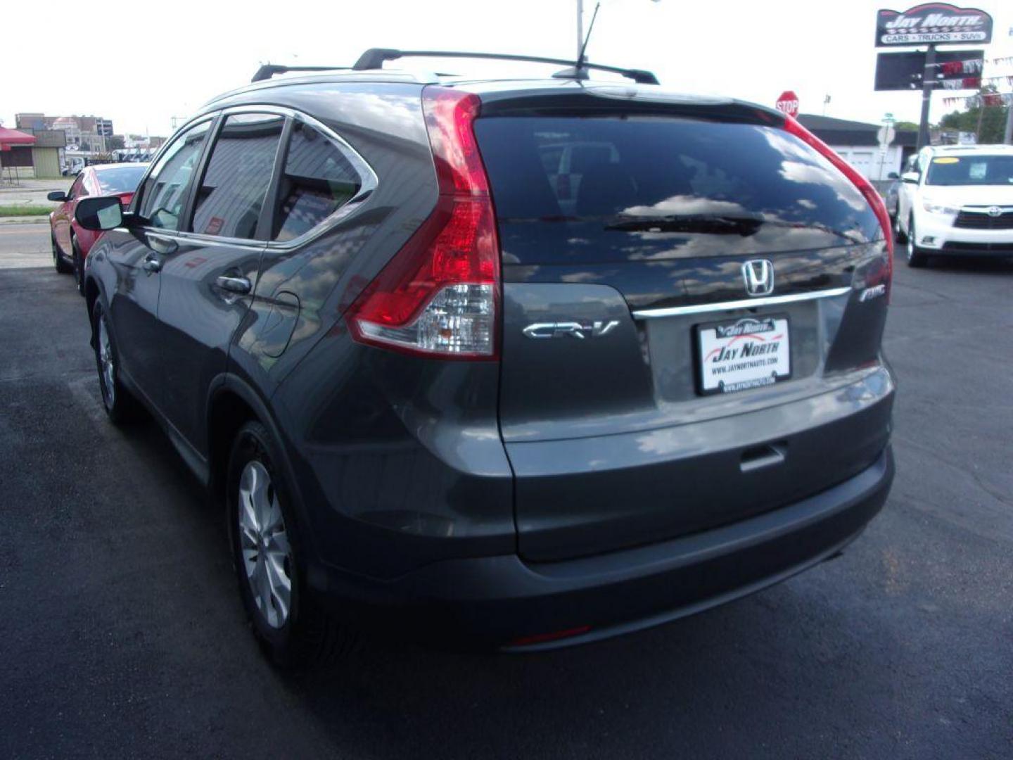 2014 GRAY HONDA CR-V EXL (2HKRM4H78EH) with an 2.4L engine, Automatic transmission, located at 501 E. Columbia St., Springfield, OH, 45503, (800) 262-7122, 39.925262, -83.801796 - ***1-Owner***Clean Carfax***EXL***AWD***New Tires***Heated Leather Seating***Sunroof***Serviced and Detailed*** Jay North Auto has offered hand picked vehicles since 1965! Our customer's enjoy a NO pressure buying experience with a small town feel. All of our vehicles get fully inspected and det - Photo#5