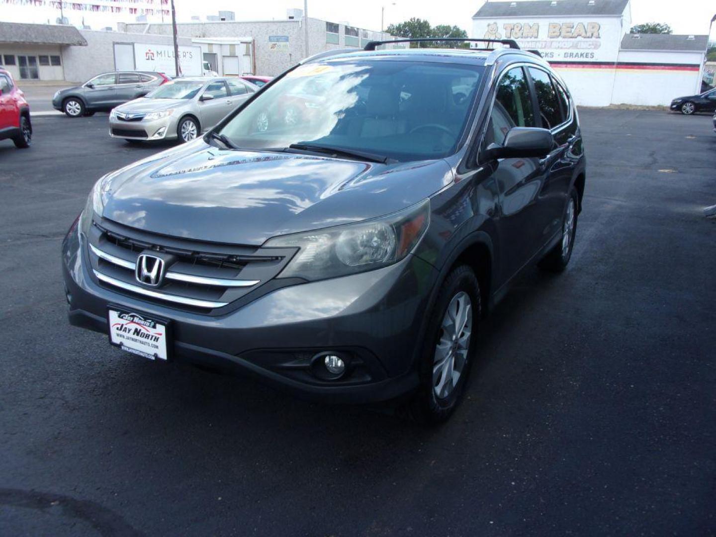 2014 GRAY HONDA CR-V EXL (2HKRM4H78EH) with an 2.4L engine, Automatic transmission, located at 501 E. Columbia St., Springfield, OH, 45503, (800) 262-7122, 39.925262, -83.801796 - ***1-Owner***Clean Carfax***EXL***AWD***New Tires***Heated Leather Seating***Sunroof***Serviced and Detailed*** Jay North Auto has offered hand picked vehicles since 1965! Our customer's enjoy a NO pressure buying experience with a small town feel. All of our vehicles get fully inspected and det - Photo#6