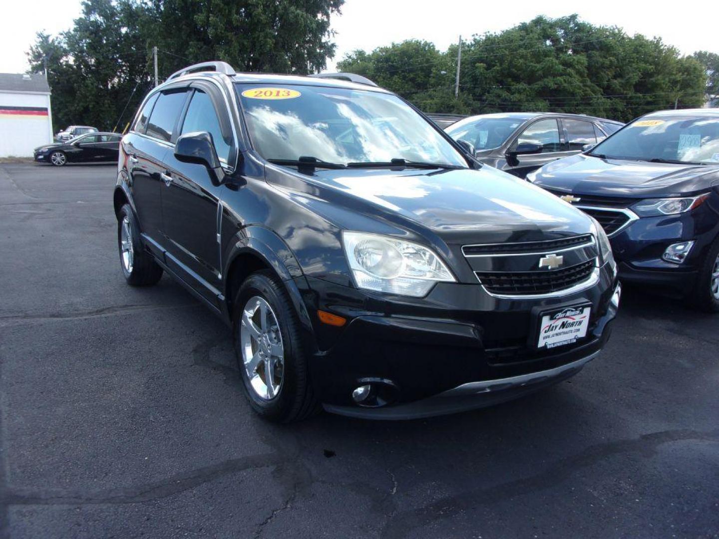 2013 BLACK CHEVROLET CAPTIVA LT (3GNAL3EK4DS) with an 2.4L engine, Automatic transmission, located at 501 E. Columbia St., Springfield, OH, 45503, (800) 262-7122, 39.925262, -83.801796 - *** Updated Timing ***Clean Carfax***LT***New Tires***Heated Leather Seating***Sunroof***Serviced and Detailed*** Jay North Auto has offered hand picked vehicles since 1965! Our customer's enjoy a NO pressure buying experience with a small town feel. All of our vehicles get fully inspected and d - Photo#2