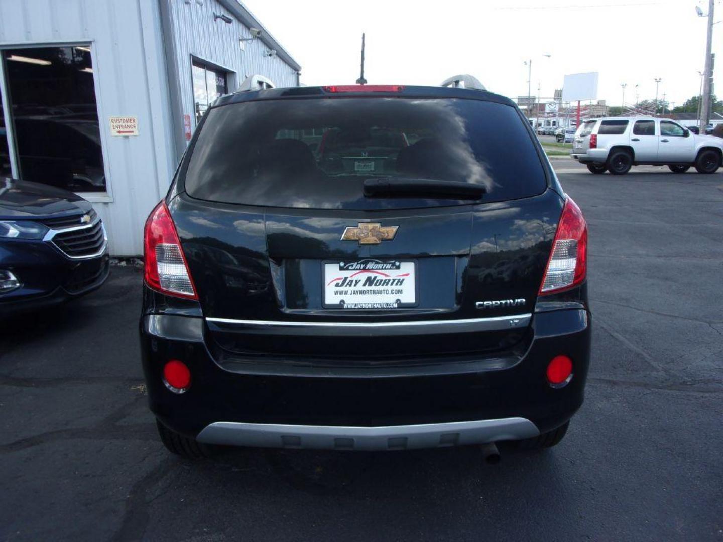 2013 BLACK CHEVROLET CAPTIVA LT (3GNAL3EK4DS) with an 2.4L engine, Automatic transmission, located at 501 E. Columbia St., Springfield, OH, 45503, (800) 262-7122, 39.925262, -83.801796 - *** Updated Timing ***Clean Carfax***LT***New Tires***Heated Leather Seating***Sunroof***Serviced and Detailed*** Jay North Auto has offered hand picked vehicles since 1965! Our customer's enjoy a NO pressure buying experience with a small town feel. All of our vehicles get fully inspected and d - Photo#4