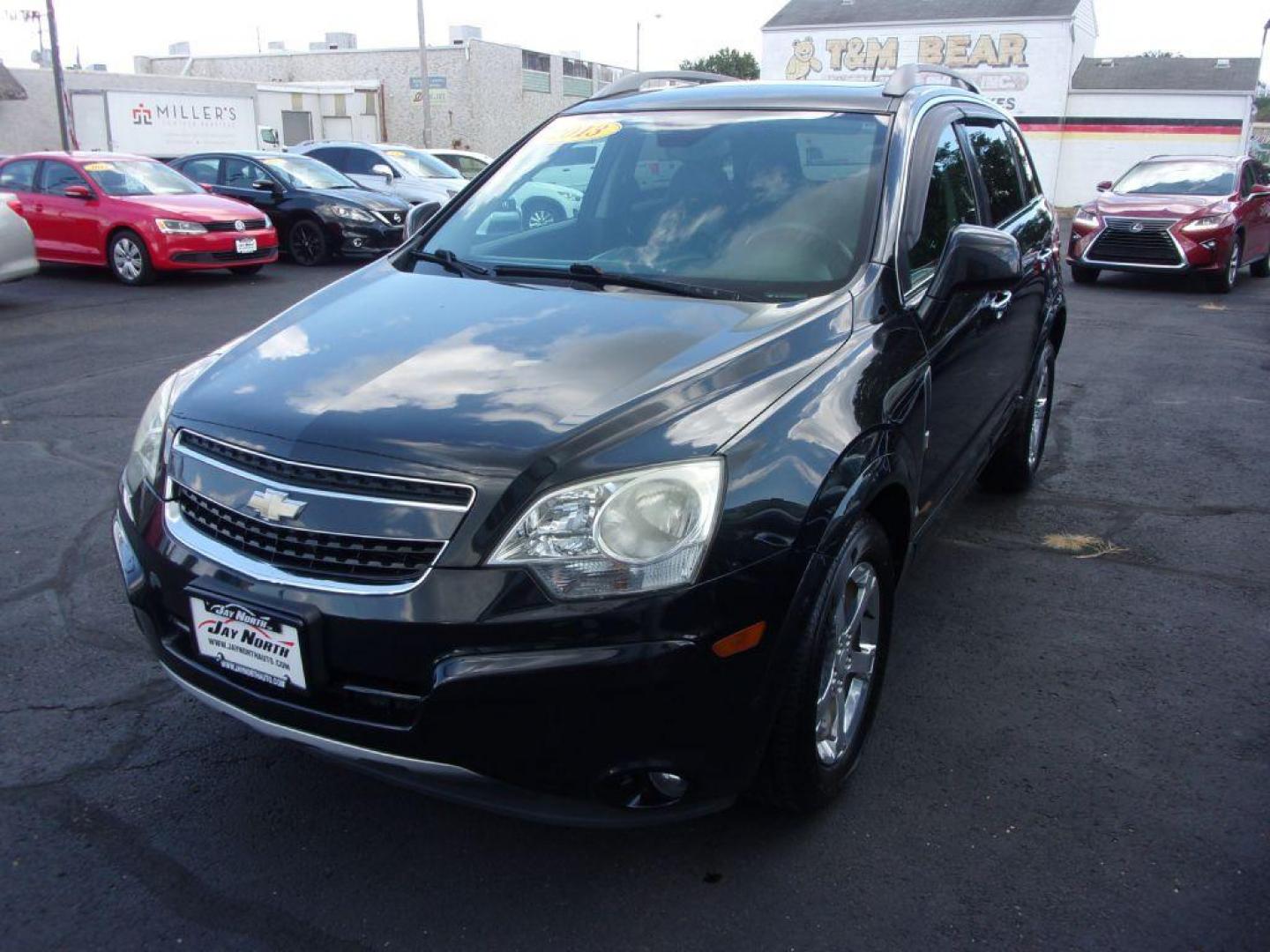 2013 BLACK CHEVROLET CAPTIVA LT (3GNAL3EK4DS) with an 2.4L engine, Automatic transmission, located at 501 E. Columbia St., Springfield, OH, 45503, (800) 262-7122, 39.925262, -83.801796 - *** Updated Timing ***Clean Carfax***LT***New Tires***Heated Leather Seating***Sunroof***Serviced and Detailed*** Jay North Auto has offered hand picked vehicles since 1965! Our customer's enjoy a NO pressure buying experience with a small town feel. All of our vehicles get fully inspected and d - Photo#6