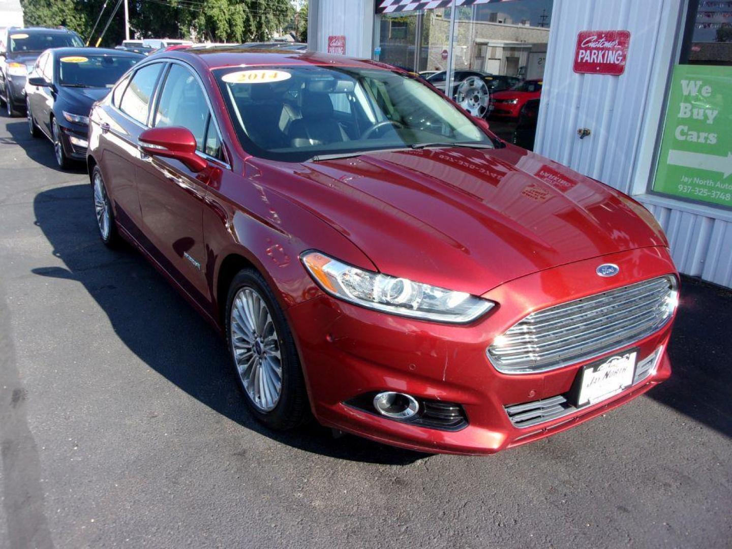 2014 RED FORD FUSION TITANIUM HYBRID (3FA6P0RU3ER) with an 2.0L engine, Continuously Variable transmission, located at 501 E. Columbia St., Springfield, OH, 45503, (800) 262-7122, 39.925262, -83.801796 - Photo#2