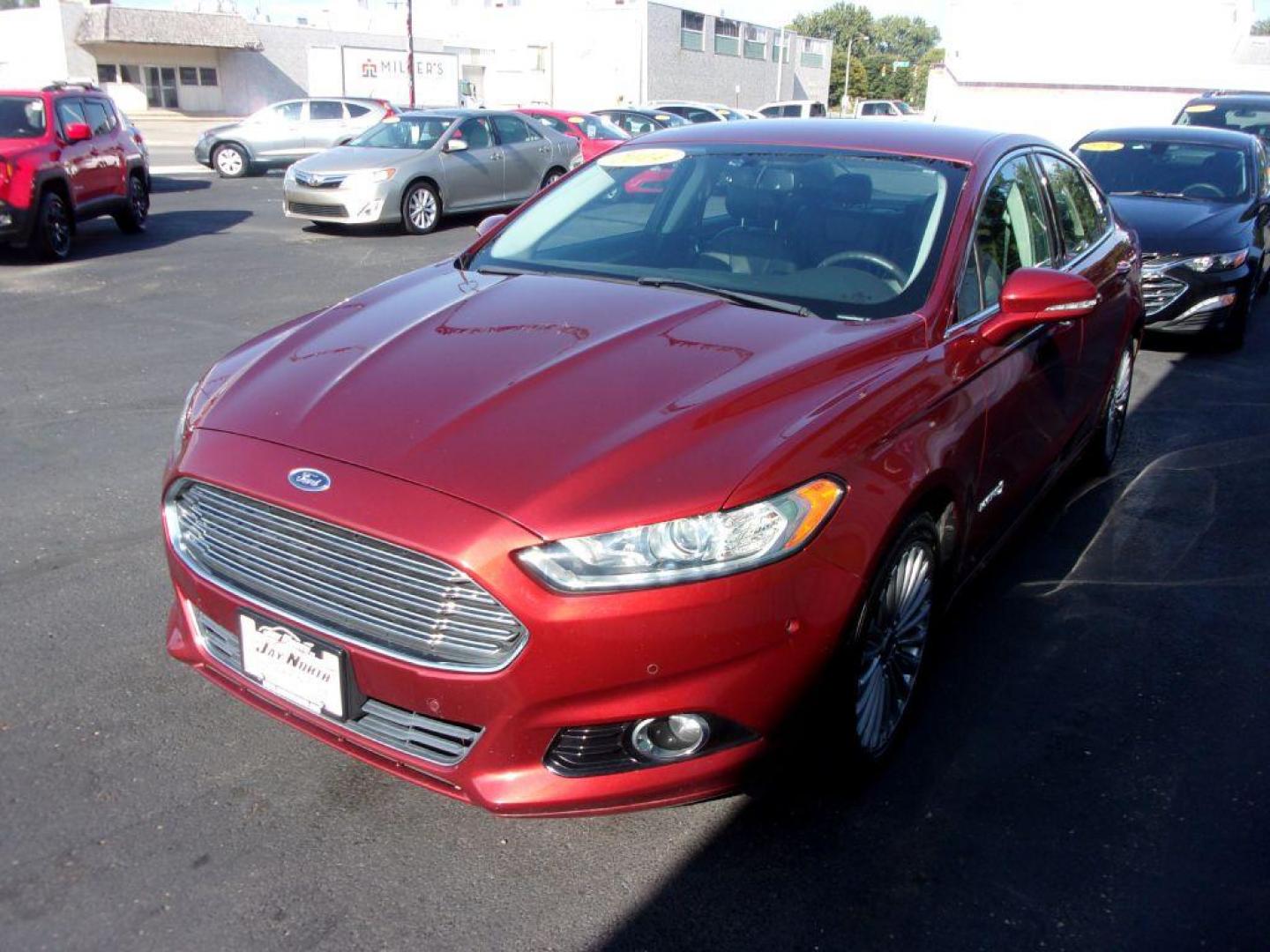 2014 RED FORD FUSION TITANIUM HYBRID (3FA6P0RU3ER) with an 2.0L engine, Continuously Variable transmission, located at 501 E. Columbia St., Springfield, OH, 45503, (800) 262-7122, 39.925262, -83.801796 - Photo#4