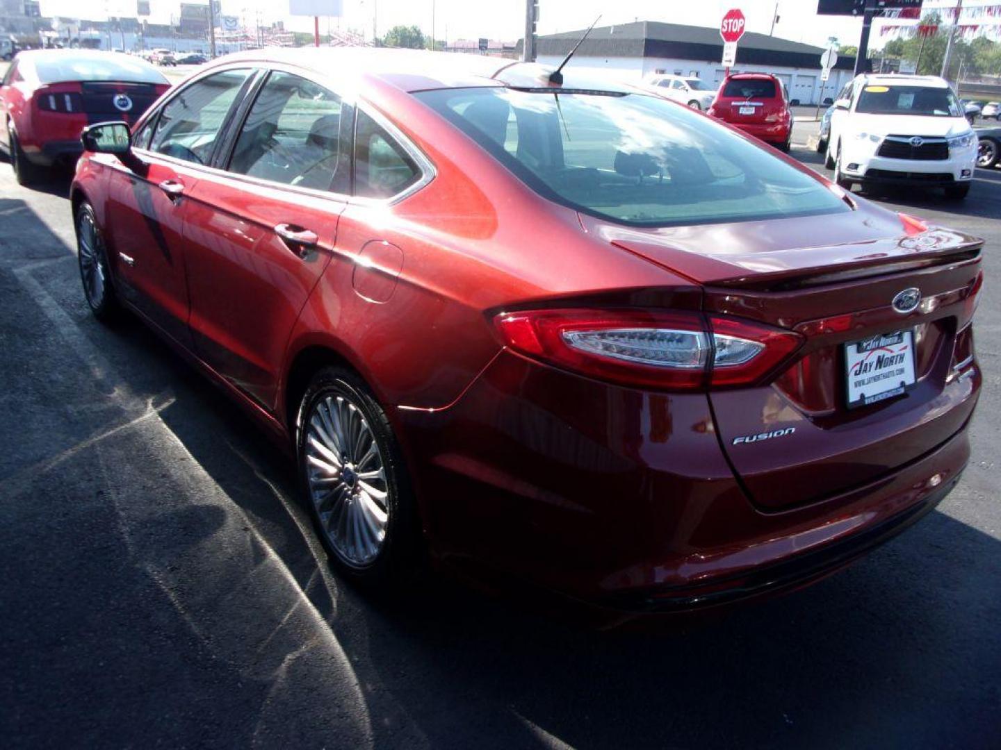 2014 RED FORD FUSION TITANIUM HYBRID (3FA6P0RU3ER) with an 2.0L engine, Continuously Variable transmission, located at 501 E. Columbia St., Springfield, OH, 45503, (800) 262-7122, 39.925262, -83.801796 - Photo#5