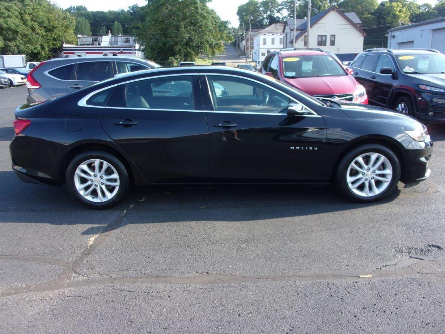 2018 BLACK CHEVROLET MALIBU LT (1G1ZD5ST1JF) with an 1.5L engine, Automatic transmission, located at 501 E. Columbia St., Springfield, OH, 45503, (800) 262-7122, 39.925262, -83.801796 - ***LT***Back-Up Camera***Remote Start***Power Seat***Serviced and Detailed*** Jay North Auto has offered hand picked vehicles since 1965! Our customer's enjoy a NO pressure buying experience with a small town feel. All of our vehicles get fully inspected and detailed. We are a preferred dealer f - Photo#0