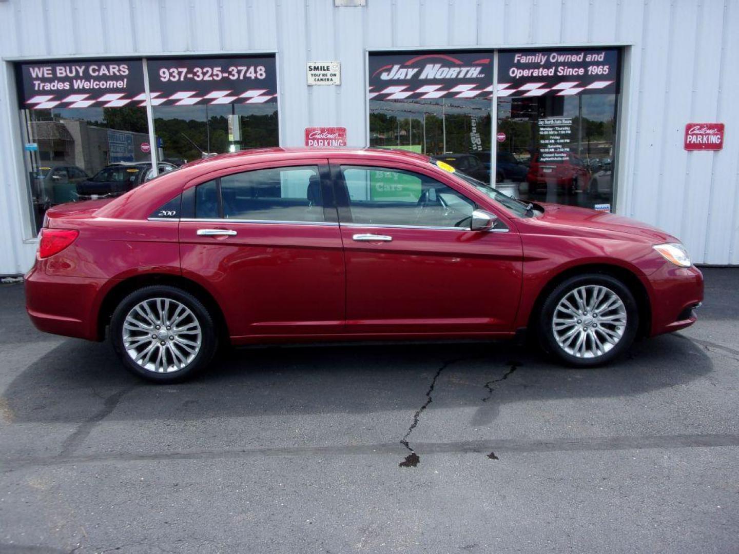 2012 RED CHRYSLER 200 LIMITED (1C3CCBCG1CN) with an 3.6L engine, Automatic transmission, located at 501 E. Columbia St., Springfield, OH, 45503, (800) 262-7122, 39.925262, -83.801796 - *** LOW MILES *** V6 *** Serviced and Detailed *** Moonroof *** Heated Leather Seating *** Premium Audio *** V6 *** Jay North Auto has offered hand picked vehicles since 1965! Our customer's enjoy a NO pressure buying experience with a small town feel. All of our vehicles get fully inspected an - Photo#0