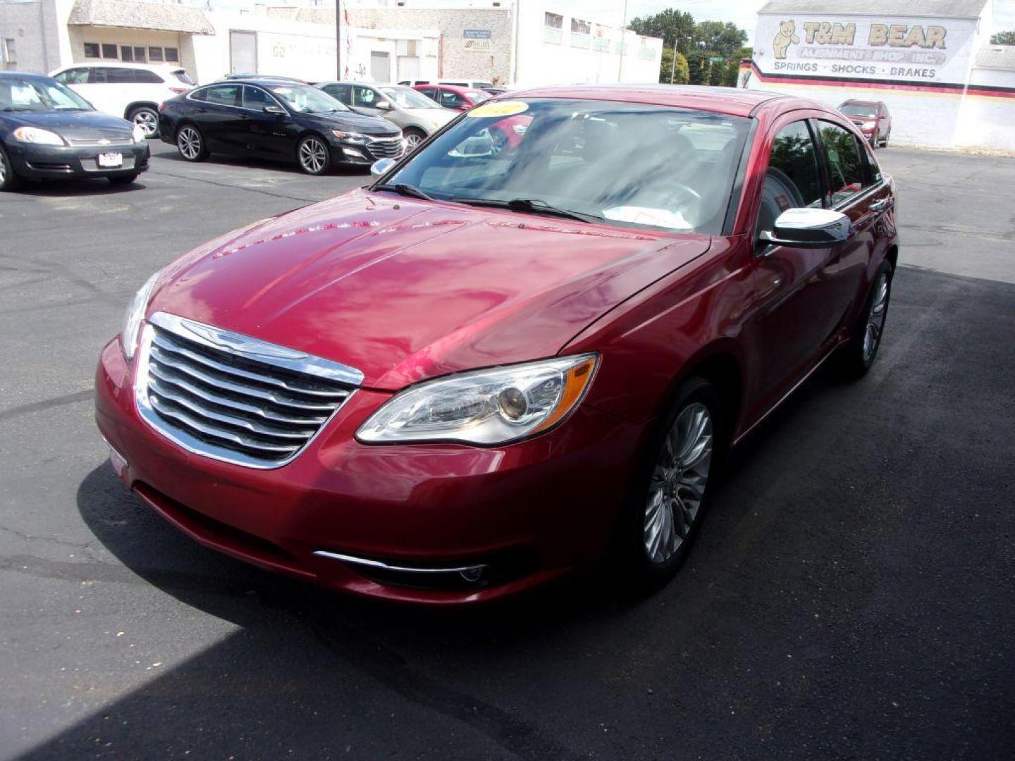 2012 RED CHRYSLER 200 LIMITED (1C3CCBCG1CN) with an 3.6L engine, Automatic transmission, located at 501 E. Columbia St., Springfield, OH, 45503, (800) 262-7122, 39.925262, -83.801796 - *** LOW MILES *** V6 *** Serviced and Detailed *** Moonroof *** Heated Leather Seating *** Premium Audio *** V6 *** Jay North Auto has offered hand picked vehicles since 1965! Our customer's enjoy a NO pressure buying experience with a small town feel. All of our vehicles get fully inspected an - Photo#4