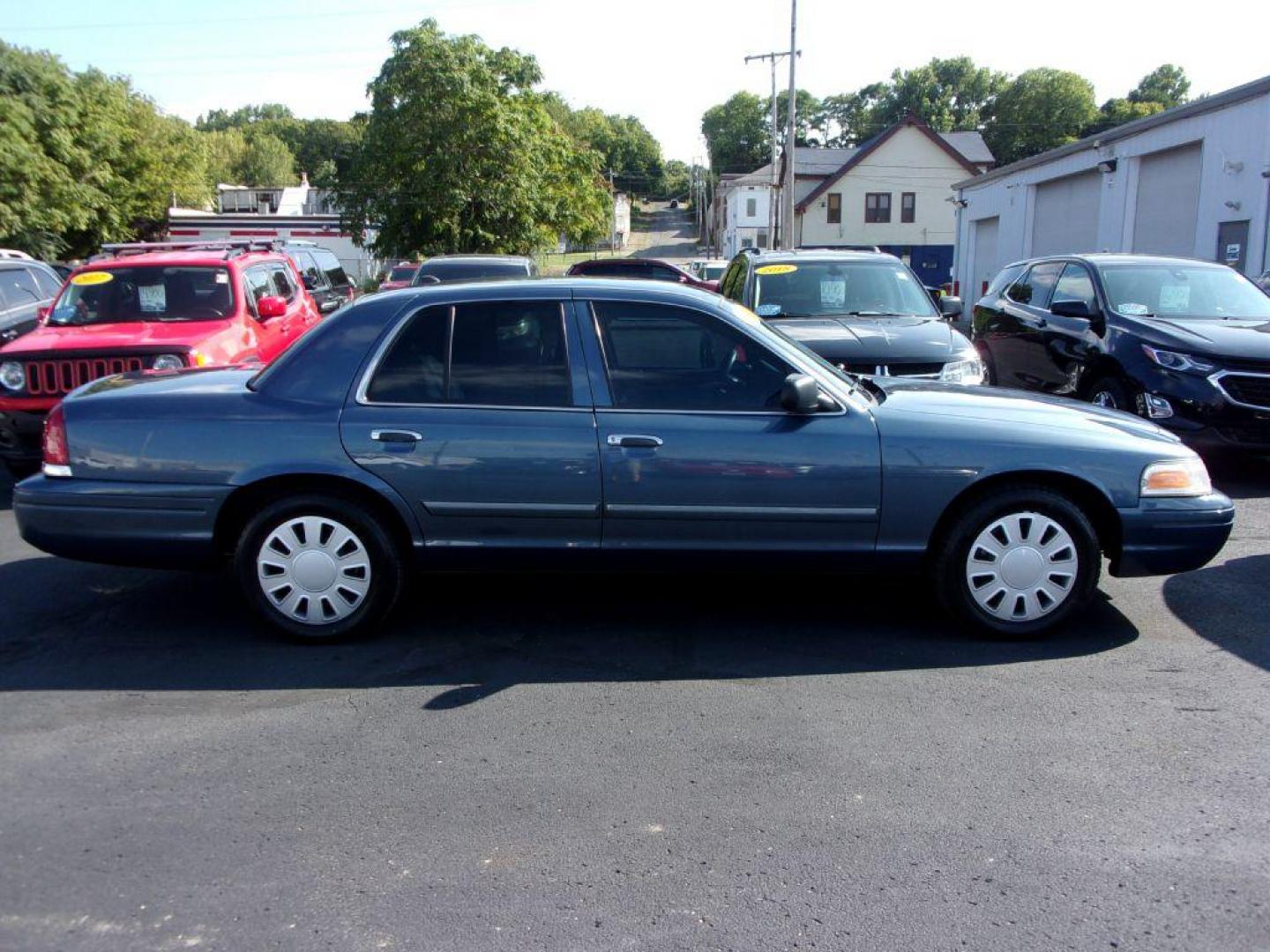 2010 BLUE FORD CROWN VICTORIA POLICE INTERCEPTOR (2FABP7BV1AX) with an 4.6L engine, Automatic transmission, located at 501 E. Columbia St., Springfield, OH, 45503, (800) 262-7122, 39.925262, -83.801796 - *** New Tires *** 1 Owner *** Texas Car *** Clean *** Serviced and Detailed *** Police Interceptor *** Low Miles *** V8 *** One owner Police Interceptor Street Appearance Package that spent it's whole life in Texas and New Mexico until we purchased it. Absolutely spotless, rust free undercarriag - Photo#0