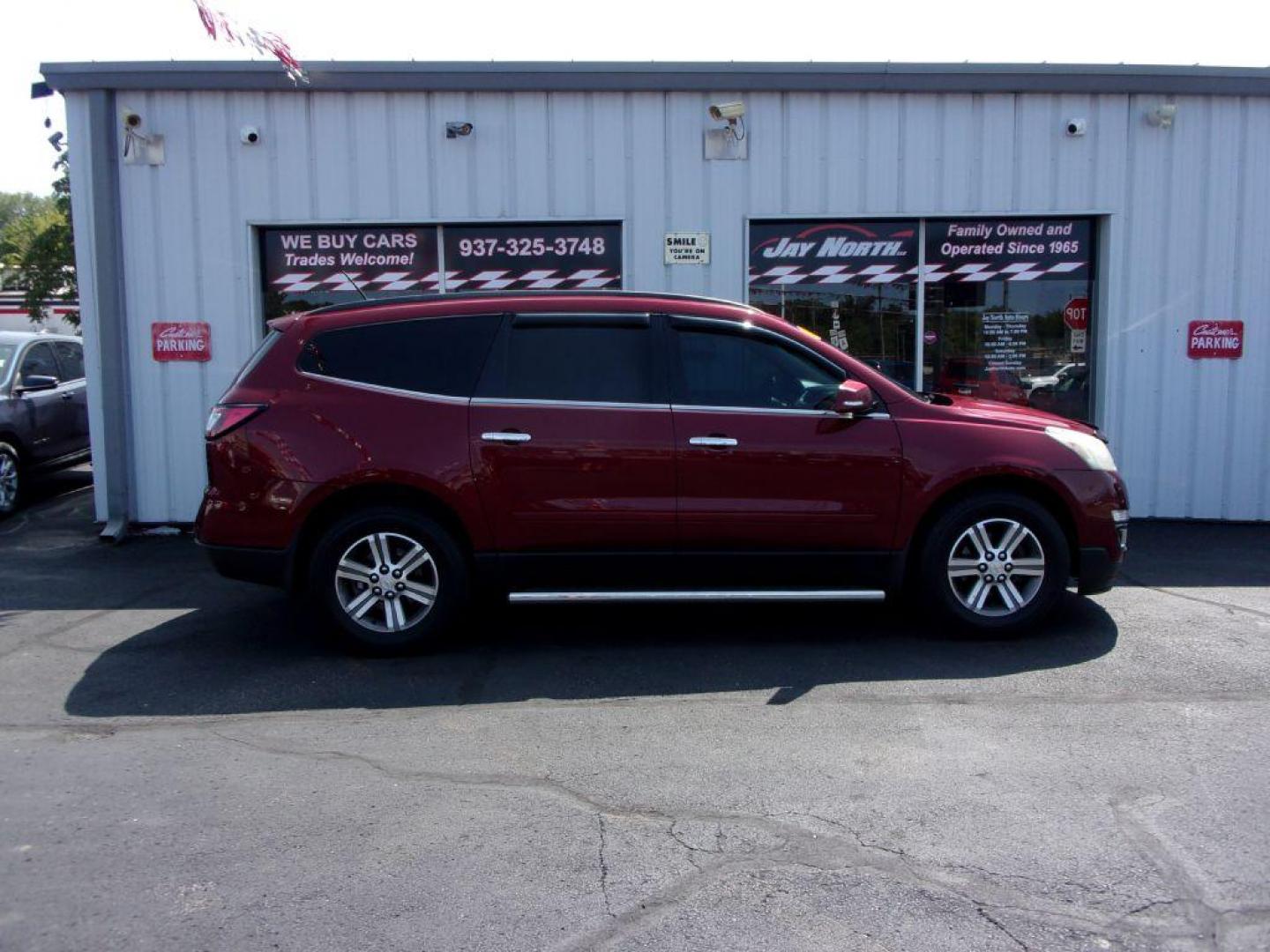 2015 RED CHEVROLET TRAVERSE LT (1GNKVGKDXFJ) with an 3.6L engine, Automatic transmission, located at 501 E. Columbia St., Springfield, OH, 45503, (800) 262-7122, 39.925262, -83.801796 - Photo#0