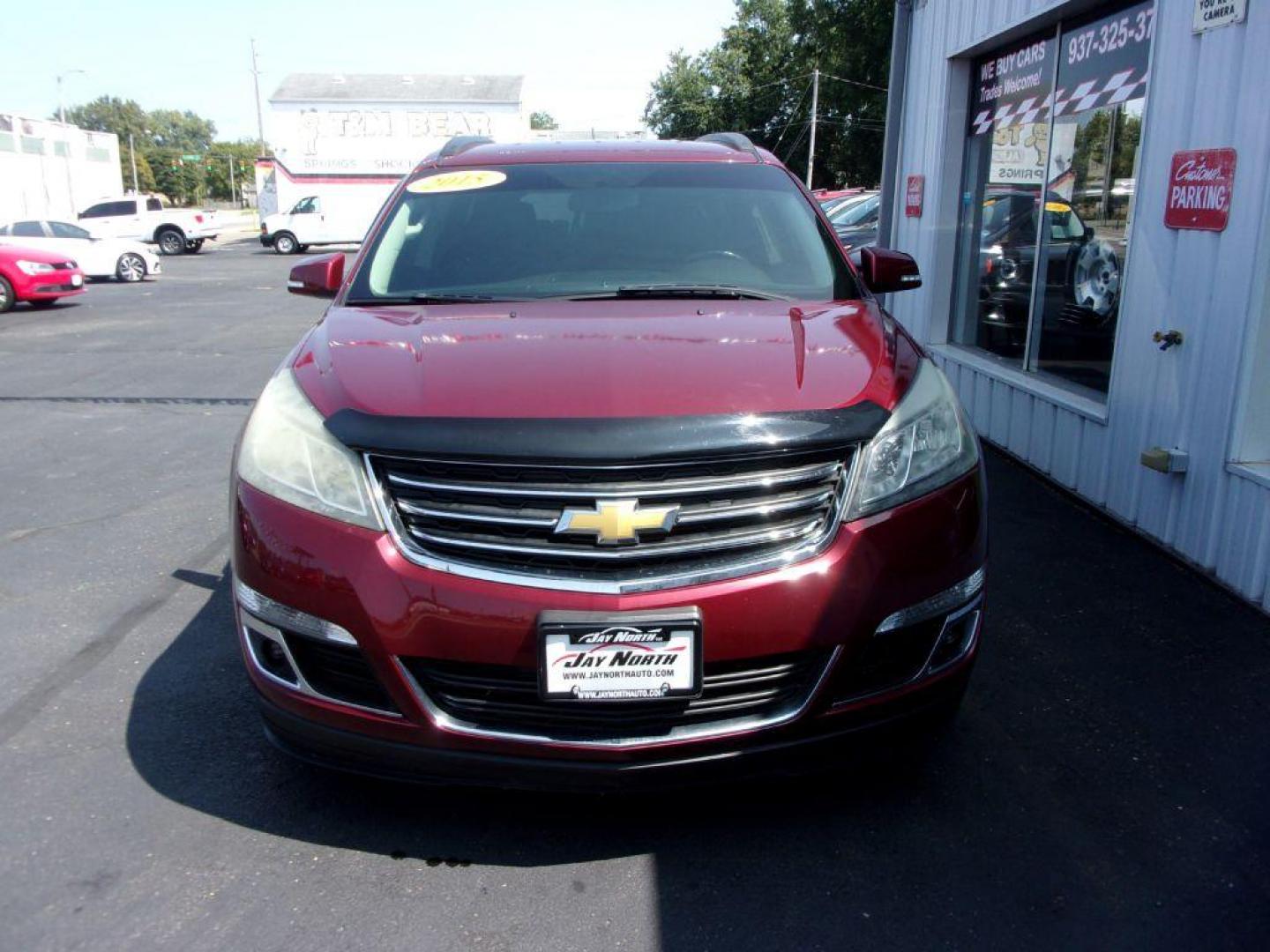 2015 RED CHEVROLET TRAVERSE LT (1GNKVGKDXFJ) with an 3.6L engine, Automatic transmission, located at 501 E. Columbia St., Springfield, OH, 45503, (800) 262-7122, 39.925262, -83.801796 - Photo#1