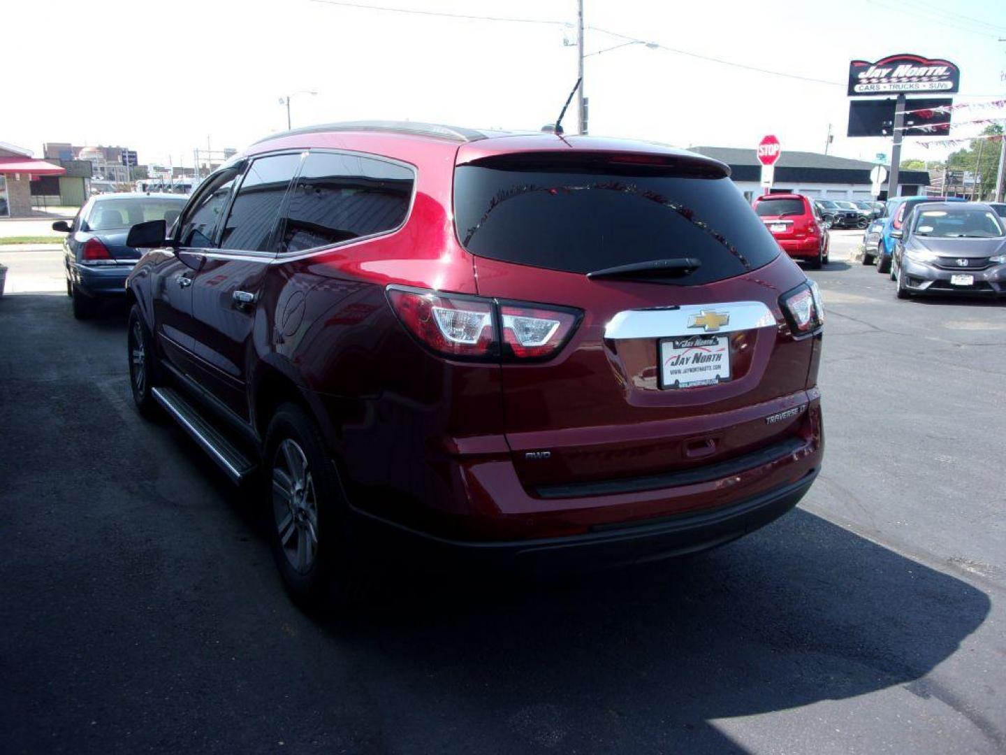 2015 RED CHEVROLET TRAVERSE LT (1GNKVGKDXFJ) with an 3.6L engine, Automatic transmission, located at 501 E. Columbia St., Springfield, OH, 45503, (800) 262-7122, 39.925262, -83.801796 - Photo#5