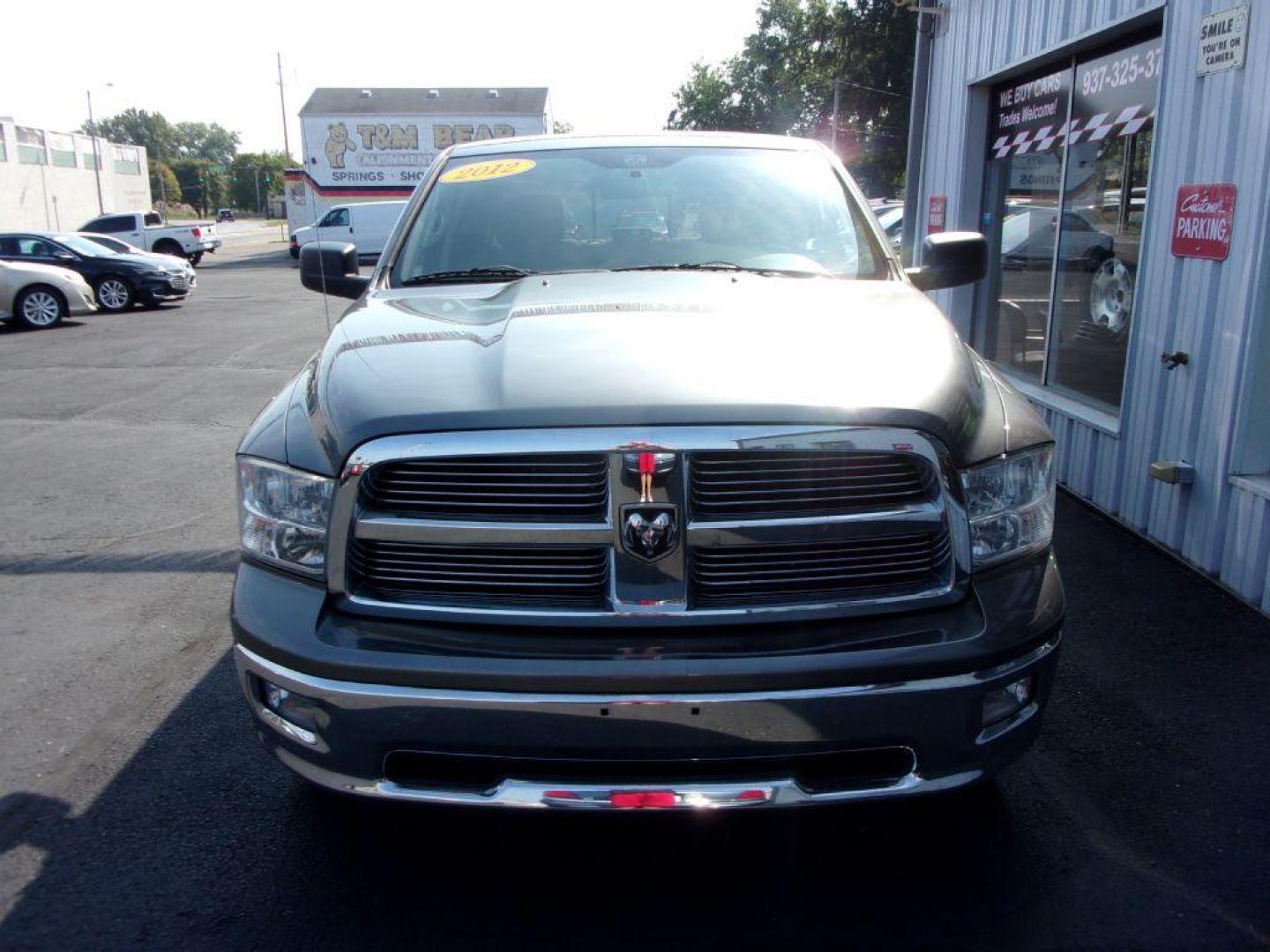 2012 GRAY DODGE RAM 1500 BIG HORN (1C6RD7LT9CS) with an 5.7L engine, Automatic transmission, located at 501 E. Columbia St., Springfield, OH, 45503, (800) 262-7122, 39.925262, -83.801796 - ***Clean Carfax***5.7L HEMI***V8***4X4***Spray in Bed Liner***SHARP***Serviced and Detailed*** Jay North Auto has offered hand picked vehicles since 1965! Our customer's enjoy a NO pressure buying experience with a small town feel. All of our vehicles get fully inspected and detailed. We are a p - Photo#1