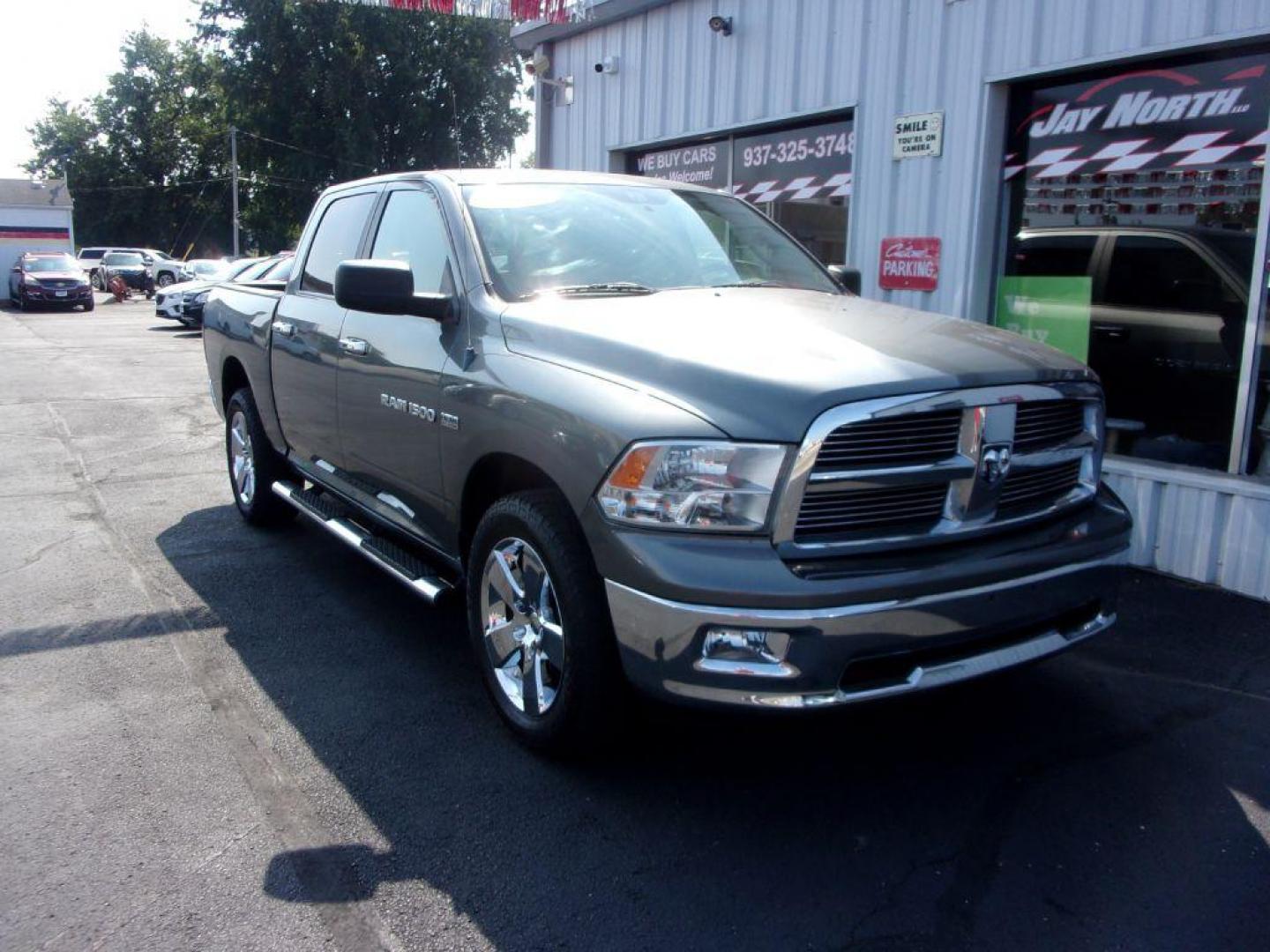 2012 GRAY DODGE RAM 1500 BIG HORN (1C6RD7LT9CS) with an 5.7L engine, Automatic transmission, located at 501 E. Columbia St., Springfield, OH, 45503, (800) 262-7122, 39.925262, -83.801796 - ***Clean Carfax***5.7L HEMI***V8***4X4***Spray in Bed Liner***SHARP***Serviced and Detailed*** Jay North Auto has offered hand picked vehicles since 1965! Our customer's enjoy a NO pressure buying experience with a small town feel. All of our vehicles get fully inspected and detailed. We are a p - Photo#2