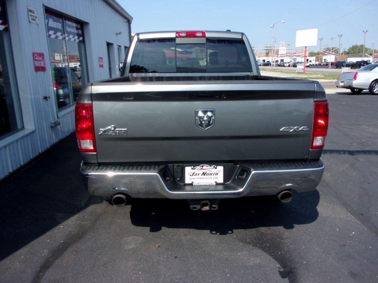 2012 GRAY DODGE RAM 1500 BIG HORN (1C6RD7LT9CS) with an 5.7L engine, Automatic transmission, located at 501 E. Columbia St., Springfield, OH, 45503, (800) 262-7122, 39.925262, -83.801796 - ***Clean Carfax***5.7L HEMI***V8***4X4***Spray in Bed Liner***SHARP***Serviced and Detailed*** Jay North Auto has offered hand picked vehicles since 1965! Our customer's enjoy a NO pressure buying experience with a small town feel. All of our vehicles get fully inspected and detailed. We are a p - Photo#4