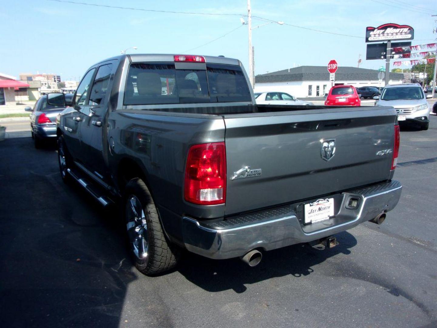 2012 GRAY DODGE RAM 1500 BIG HORN (1C6RD7LT9CS) with an 5.7L engine, Automatic transmission, located at 501 E. Columbia St., Springfield, OH, 45503, (800) 262-7122, 39.925262, -83.801796 - ***Clean Carfax***5.7L HEMI***V8***4X4***Spray in Bed Liner***SHARP***Serviced and Detailed*** Jay North Auto has offered hand picked vehicles since 1965! Our customer's enjoy a NO pressure buying experience with a small town feel. All of our vehicles get fully inspected and detailed. We are a p - Photo#5