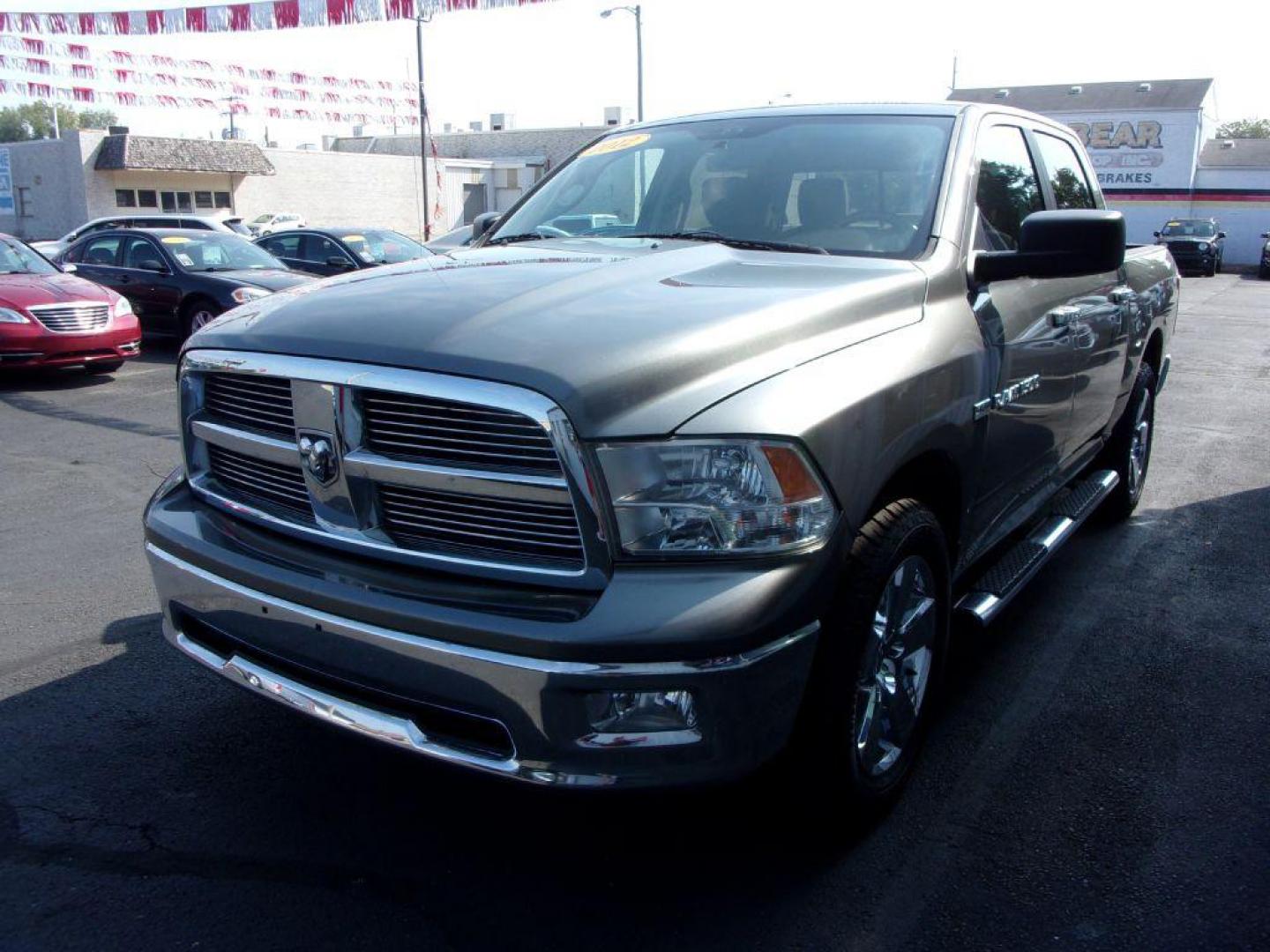 2012 GRAY DODGE RAM 1500 BIG HORN (1C6RD7LT9CS) with an 5.7L engine, Automatic transmission, located at 501 E. Columbia St., Springfield, OH, 45503, (800) 262-7122, 39.925262, -83.801796 - ***Clean Carfax***5.7L HEMI***V8***4X4***Spray in Bed Liner***SHARP***Serviced and Detailed*** Jay North Auto has offered hand picked vehicles since 1965! Our customer's enjoy a NO pressure buying experience with a small town feel. All of our vehicles get fully inspected and detailed. We are a p - Photo#6