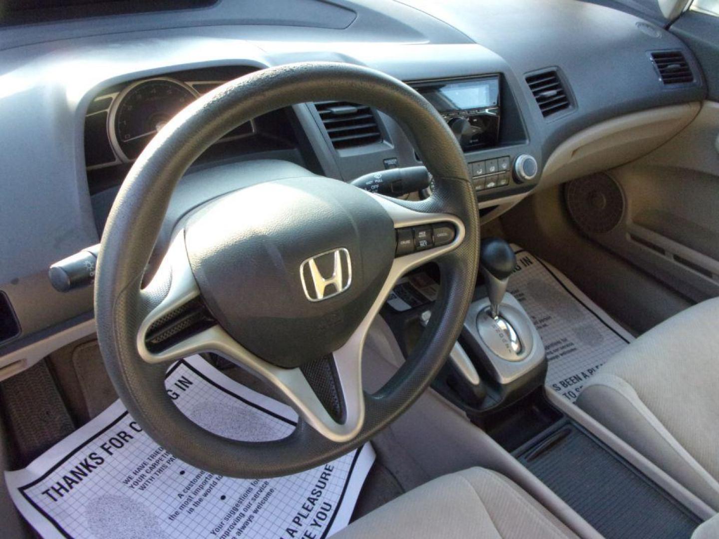 2010 WHITE HONDA CIVIC LX (19XFA1F55AE) with an 1.8L engine, Automatic transmission, located at 501 E. Columbia St., Springfield, OH, 45503, (800) 262-7122, 39.925262, -83.801796 - *** LX *** Serviced and Detailed *** FWD *** Jay North Auto has offered hand picked vehicles since 1965! Our customer's enjoy a NO pressure buying experience with a small town feel. All of our vehicles get fully inspected and detailed. We are a preferred dealer for many local credit unions and l - Photo#10