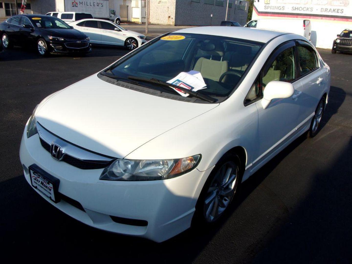 2010 WHITE HONDA CIVIC LX (19XFA1F55AE) with an 1.8L engine, Automatic transmission, located at 501 E. Columbia St., Springfield, OH, 45503, (800) 262-7122, 39.925262, -83.801796 - *** LX *** Serviced and Detailed *** FWD *** Jay North Auto has offered hand picked vehicles since 1965! Our customer's enjoy a NO pressure buying experience with a small town feel. All of our vehicles get fully inspected and detailed. We are a preferred dealer for many local credit unions and l - Photo#2