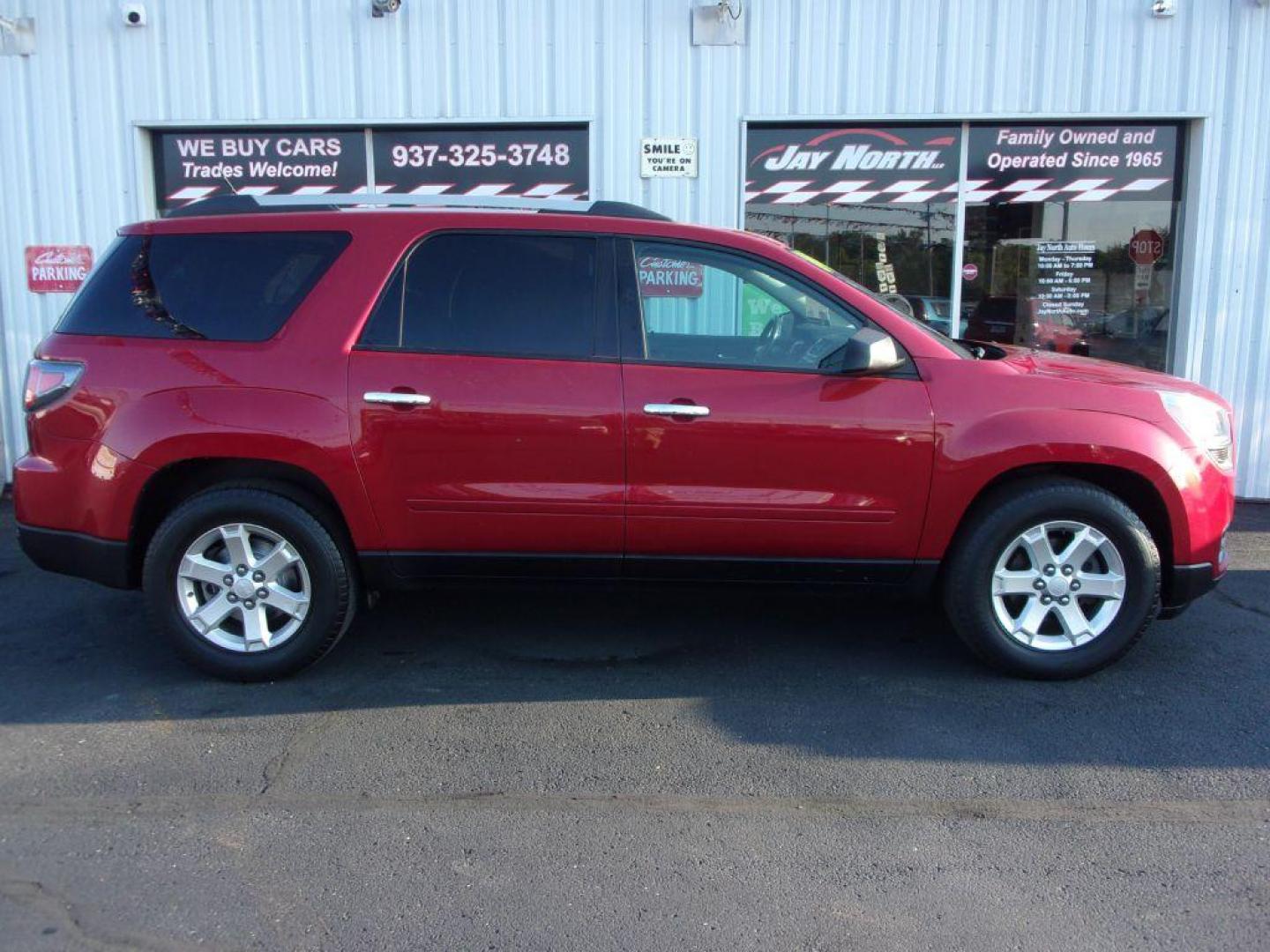 2014 RED GMC ACADIA SLE-2 (1GKKRPKDXEJ) with an 3.6L engine, Automatic transmission, located at 501 E. Columbia St., Springfield, OH, 45503, (800) 262-7122, 39.925262, -83.801796 - *** SLE *** Heated Leather Seating *** V6 *** Panoramic Roof *** Second Row Captain seats *** 3rd Row Seating *** Power Rear Gate *** Remote Start *** FWD *** Serviced and Detailed *** Jay North Auto has offered hand picked vehicles since 1965! Our customer's enjoy a NO pressure buying experienc - Photo#0