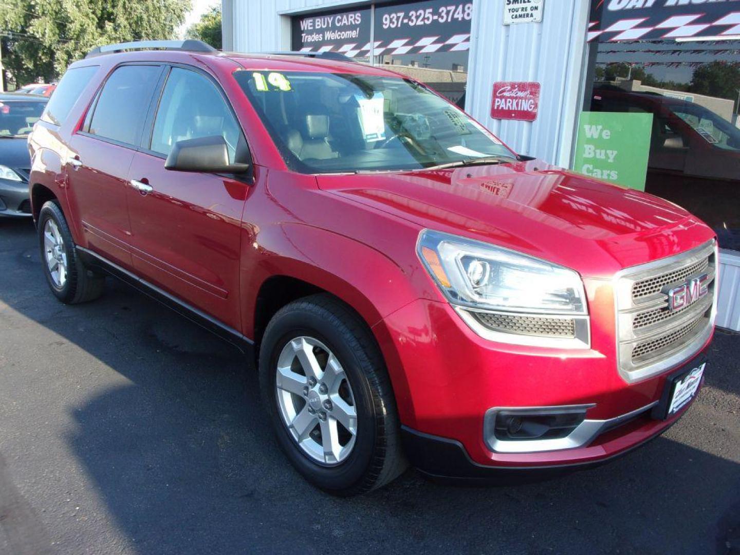 2014 RED GMC ACADIA SLE-2 (1GKKRPKDXEJ) with an 3.6L engine, Automatic transmission, located at 501 E. Columbia St., Springfield, OH, 45503, (800) 262-7122, 39.925262, -83.801796 - *** SLE *** Heated Leather Seating *** V6 *** Panoramic Roof *** Second Row Captain seats *** 3rd Row Seating *** Power Rear Gate *** Remote Start *** FWD *** Serviced and Detailed *** Jay North Auto has offered hand picked vehicles since 1965! Our customer's enjoy a NO pressure buying experienc - Photo#1