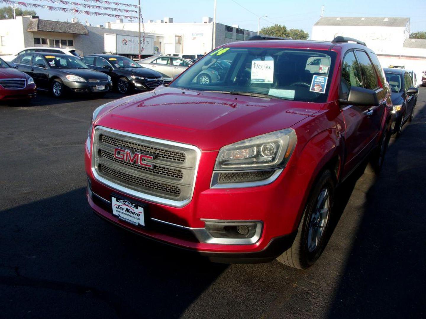 2014 RED GMC ACADIA SLE-2 (1GKKRPKDXEJ) with an 3.6L engine, Automatic transmission, located at 501 E. Columbia St., Springfield, OH, 45503, (800) 262-7122, 39.925262, -83.801796 - *** SLE *** Heated Leather Seating *** V6 *** Panoramic Roof *** Second Row Captain seats *** 3rd Row Seating *** Power Rear Gate *** Remote Start *** FWD *** Serviced and Detailed *** Jay North Auto has offered hand picked vehicles since 1965! Our customer's enjoy a NO pressure buying experienc - Photo#3