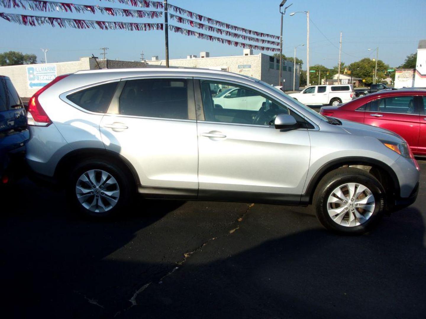 2014 SILVER HONDA CR-V EXL (2HKRM4H71EH) with an 2.4L engine, Automatic transmission, located at 501 E. Columbia St., Springfield, OH, 45503, (800) 262-7122, 39.925262, -83.801796 - Photo#0