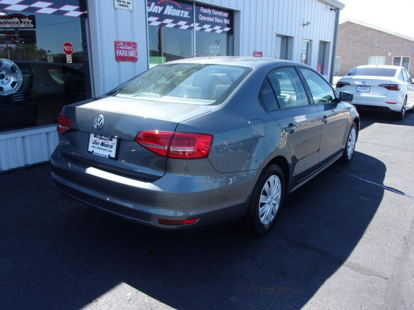 2015 GRAY VOLKSWAGEN JETTA S (3VW2K7AJ3FM) with an 2L engine, Automatic transmission, located at 501 E. Columbia St., Springfield, OH, 45503, (800) 262-7122, 39.925262, -83.801796 - *** New Tires *** LOW MILES *** Serviced and Detailed *** Automatic *** FWD *** Jay North Auto has offered hand picked vehicles since 1965! Our customer's enjoy a NO pressure buying experience with a small town feel. All of our vehicles get fully inspected and detailed. We are a preferred deale - Photo#2