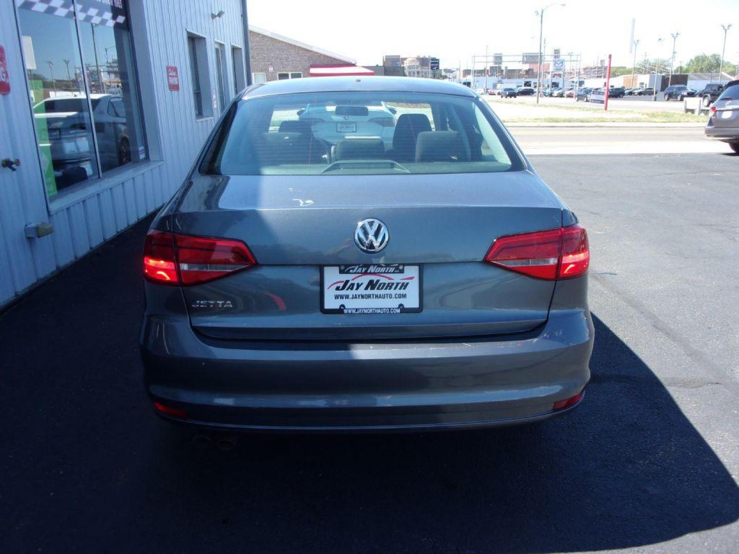 2015 GRAY VOLKSWAGEN JETTA S (3VW2K7AJ3FM) with an 2L engine, Automatic transmission, located at 501 E. Columbia St., Springfield, OH, 45503, (800) 262-7122, 39.925262, -83.801796 - *** New Tires *** LOW MILES *** Serviced and Detailed *** Automatic *** FWD *** Jay North Auto has offered hand picked vehicles since 1965! Our customer's enjoy a NO pressure buying experience with a small town feel. All of our vehicles get fully inspected and detailed. We are a preferred deale - Photo#3