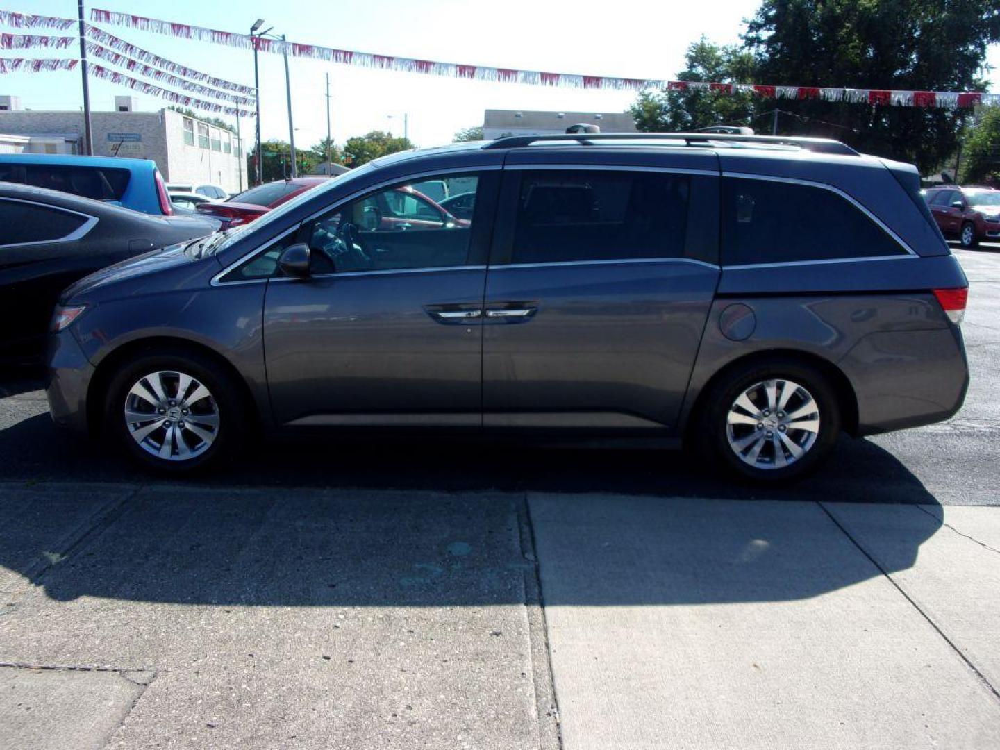 2015 GRAY HONDA ODYSSEY EXL (5FNRL5H63FB) with an 3.5L engine, Automatic transmission, located at 501 E. Columbia St., Springfield, OH, 45503, (800) 262-7122, 39.925262, -83.801796 - *** 1 Owner *** EX -L *** Leather *** Moonroof *** Premium Audio *** NICE!!! *** Serviced and Detailed *** Jay North Auto has offered hand picked vehicles since 1965! Our customer's enjoy a NO pressure buying experience with a small town feel. All of our vehicles get fully inspected and detaile - Photo#1