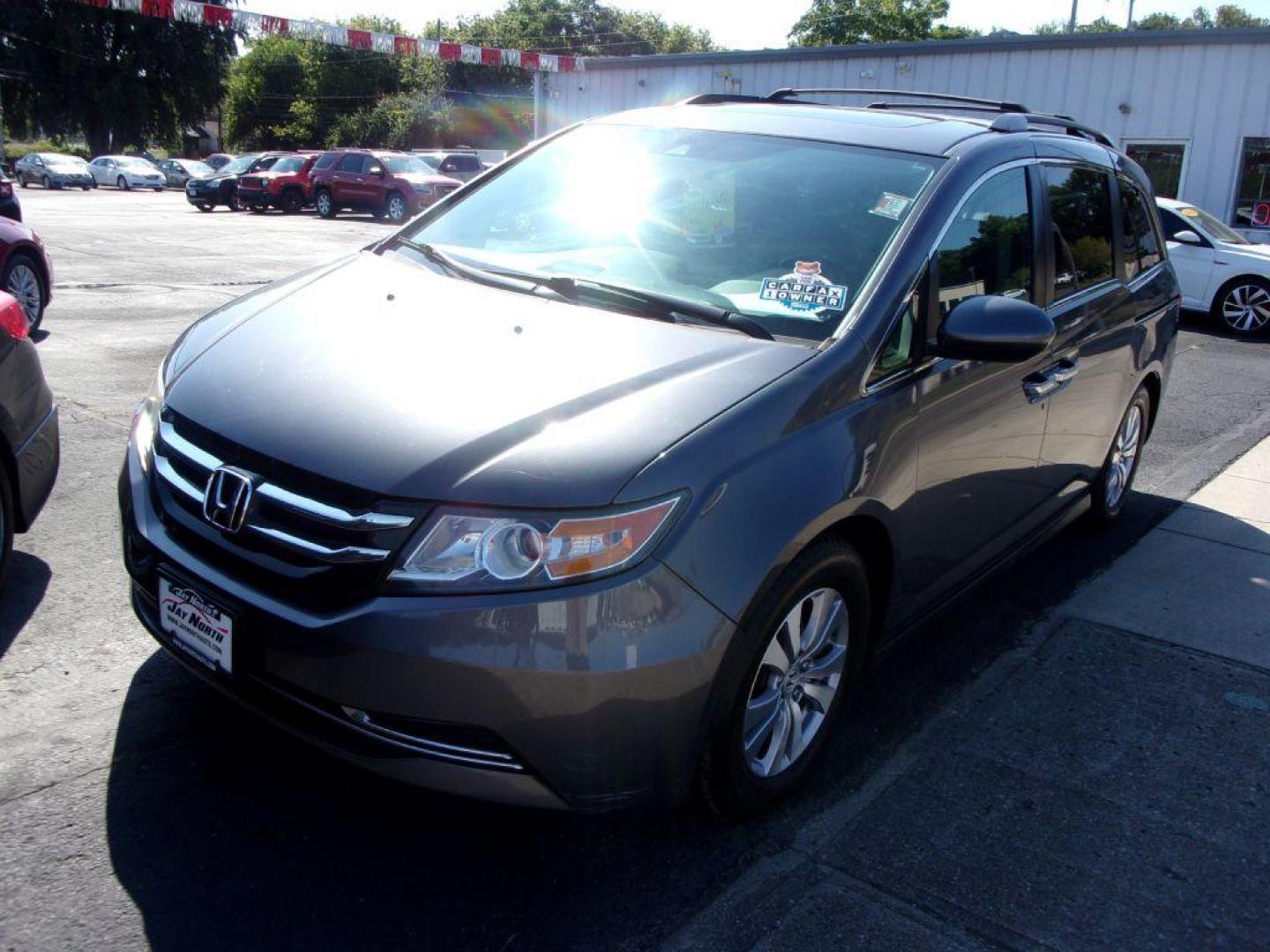 2015 GRAY HONDA ODYSSEY EXL (5FNRL5H63FB) with an 3.5L engine, Automatic transmission, located at 501 E. Columbia St., Springfield, OH, 45503, (800) 262-7122, 39.925262, -83.801796 - *** 1 Owner *** EX -L *** Leather *** Moonroof *** Premium Audio *** NICE!!! *** Serviced and Detailed *** Jay North Auto has offered hand picked vehicles since 1965! Our customer's enjoy a NO pressure buying experience with a small town feel. All of our vehicles get fully inspected and detaile - Photo#2