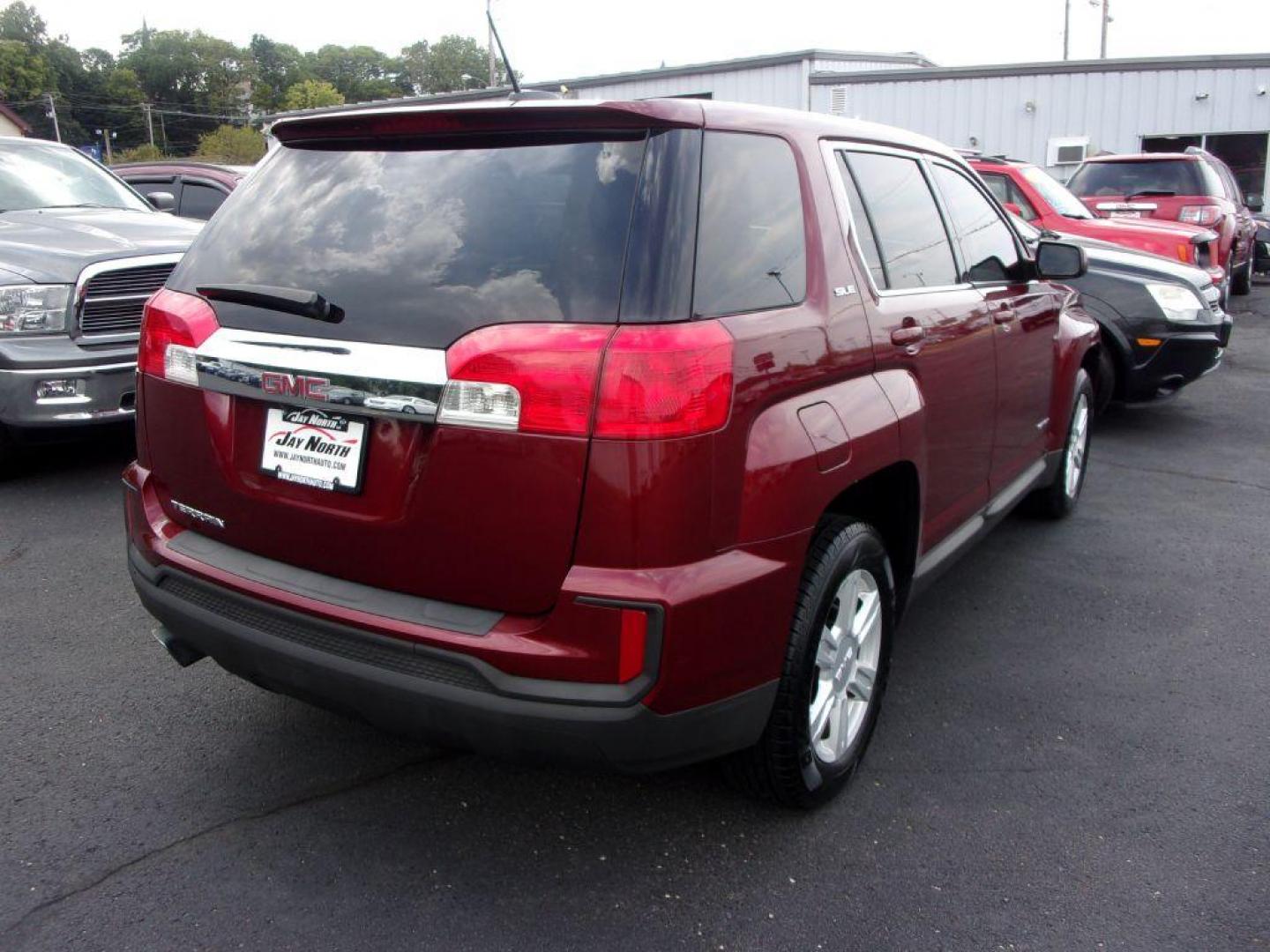 2016 RED GMC TERRAIN SLE (2GKALMEK5G6) with an 2.4L engine, Automatic transmission, located at 501 E. Columbia St., Springfield, OH, 45503, (800) 262-7122, 39.925262, -83.801796 - Photo#2