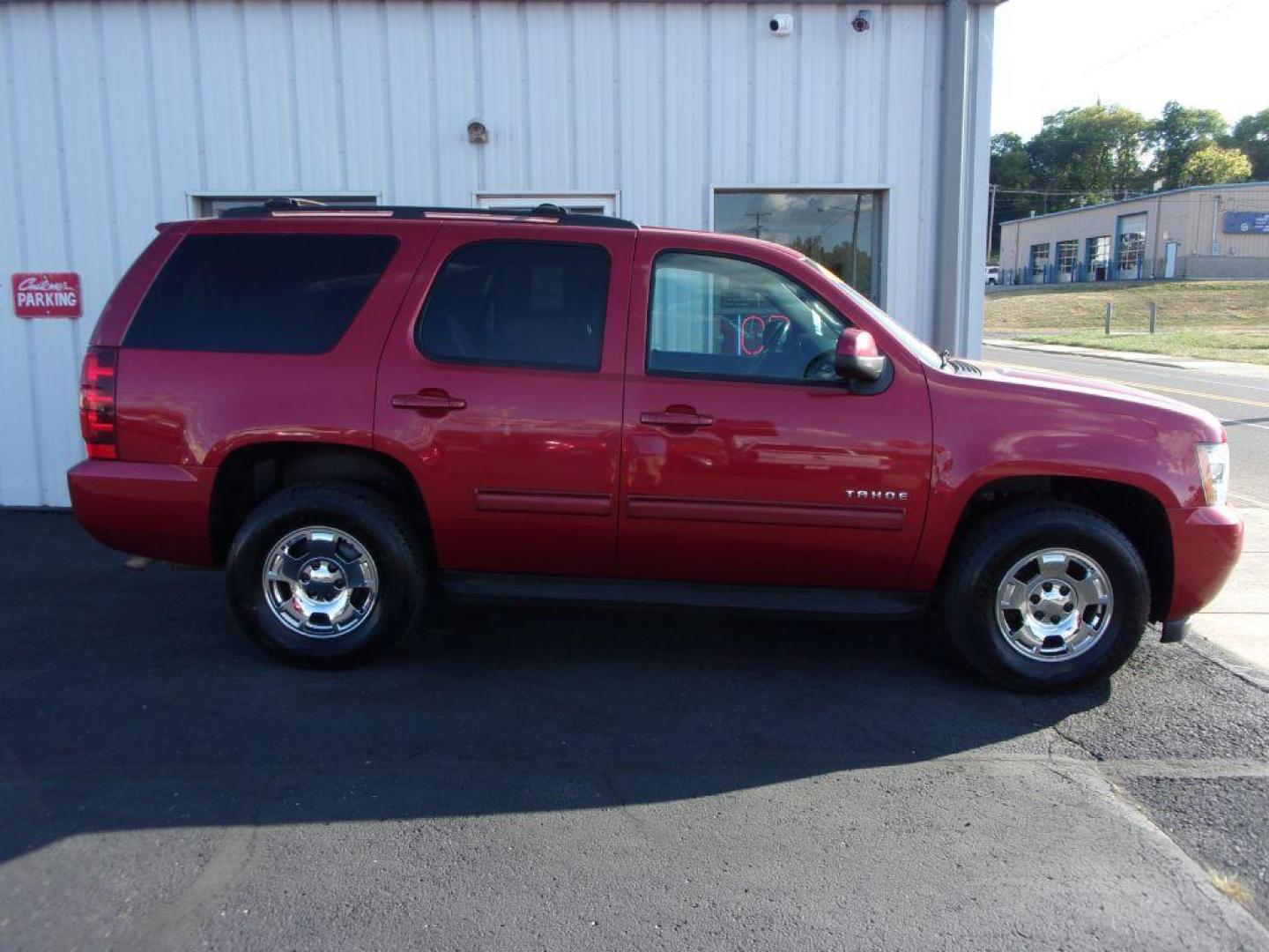 2012 RED CHEVROLET TAHOE 1500 LS (1GNSCAE0XCR) with an 5.3L engine, Automatic transmission, located at 501 E. Columbia St., Springfield, OH, 45503, (800) 262-7122, 39.925262, -83.801796 - *** New Tires *** Serviced and Detailed *** Third Row Seating *** LS *** 5.3L V8 *** 2WD *** NICE!!! *** 2 Owner Clean CarFax *** Jay North Auto has offered hand picked vehicles since 1965! Our customer's enjoy a NO pressure buying experience with a small town feel. All of our vehicles get full - Photo#0