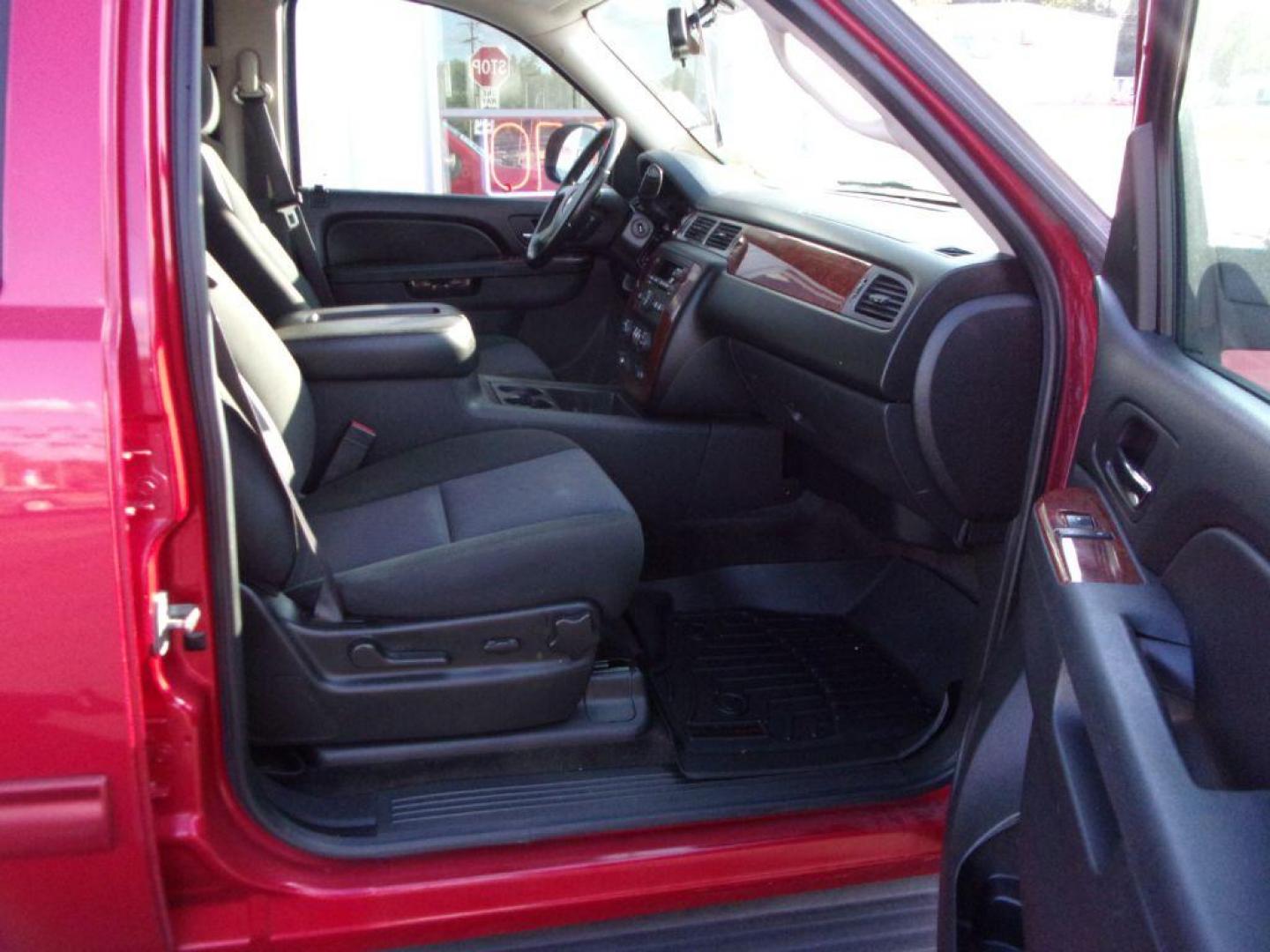 2012 RED CHEVROLET TAHOE 1500 LS (1GNSCAE0XCR) with an 5.3L engine, Automatic transmission, located at 501 E. Columbia St., Springfield, OH, 45503, (800) 262-7122, 39.925262, -83.801796 - *** New Tires *** Serviced and Detailed *** Third Row Seating *** LS *** 5.3L V8 *** 2WD *** NICE!!! *** 2 Owner Clean CarFax *** Jay North Auto has offered hand picked vehicles since 1965! Our customer's enjoy a NO pressure buying experience with a small town feel. All of our vehicles get full - Photo#17