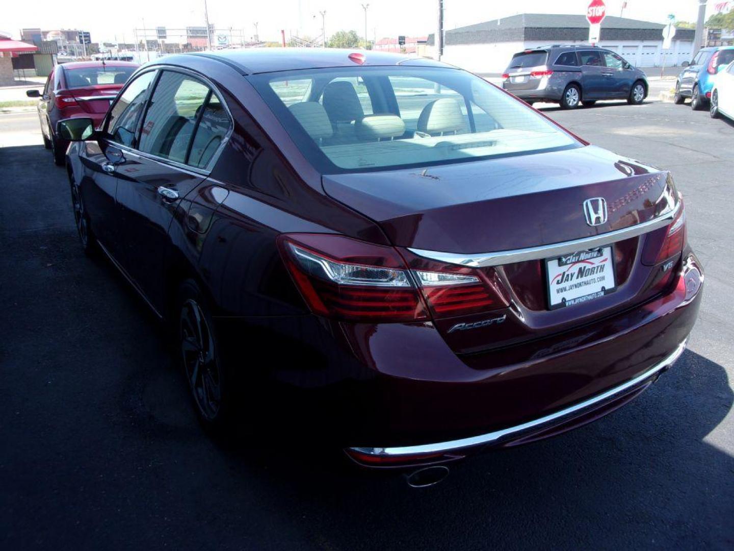 2017 RED HONDA ACCORD EXL (1HGCR3F80HA) with an 3.5L engine, Automatic transmission, located at 501 E. Columbia St., Springfield, OH, 45503, (800) 262-7122, 39.925262, -83.801796 - ***Clean Carfax***EXL***Heated Leather Seating***Sunroof***SHARP***Serviced and Detailed*** Jay North Auto has offered hand picked vehicles since 1965! Our customer's enjoy a NO pressure buying experience with a small town feel. All of our vehicles get fully inspected and detailed. We are a pref - Photo#5