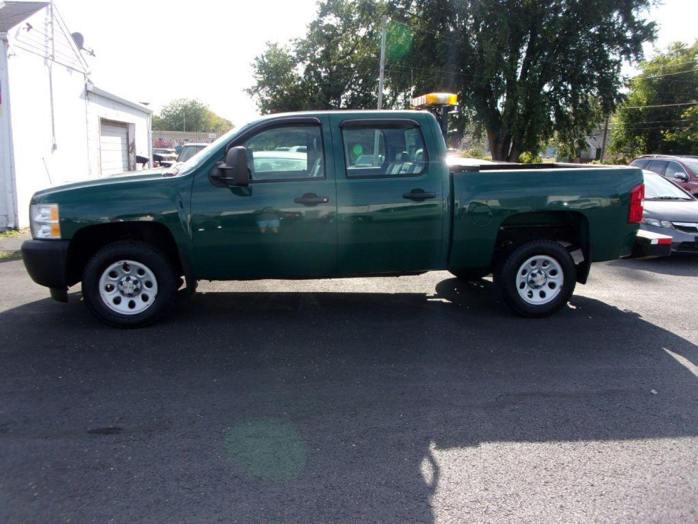 2011 GREEN CHEVROLET SILVERADO 1500 CREW CAB (3GCPCPEA1BG) with an 4.8L engine, Automatic transmission, located at 501 E. Columbia St., Springfield, OH, 45503, (800) 262-7122, 39.925262, -83.801796 - Photo#0