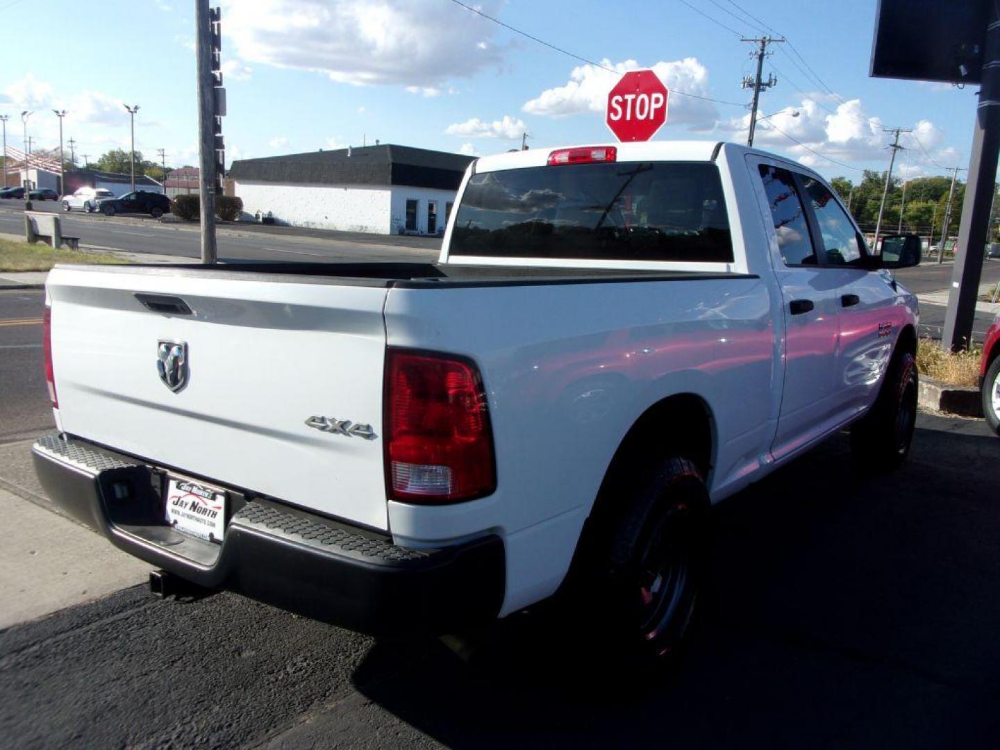 2016 WHITE RAM 1500 TRADESMAN (1C6RR7FG6GS) with an 3.6L engine, Automatic transmission, located at 501 E. Columbia St., Springfield, OH, 45503, (800) 262-7122, 39.925262, -83.801796 - *** New Michelin Tires *** New Wheels *** 2.5 Inch level kit *** Serviced and Detailed *** 4x4 3.6L *** NICE!!! *** 3.55 Rear Axle Ratio Uconnectr 5.0 5.0-Inch Touchscreen Display - Photo#5