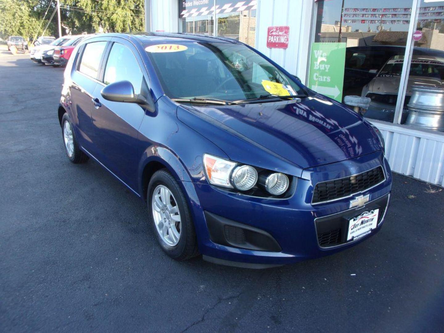 2013 BLUE CHEVROLET SONIC LT (1G1JC6SG2D4) with an 1.8L engine, Automatic transmission, located at 501 E. Columbia St., Springfield, OH, 45503, (800) 262-7122, 39.925262, -83.801796 - *** Serviced and Detailed *** Automatic *** LT *** Gas Saver *** Remote Start *** Jay North Auto has offered hand picked vehicles since 1965! Our customer's enjoy a NO pressure buying experience with a small town feel. All of our vehicles get fully inspected and detailed. We are a preferred dea - Photo#1