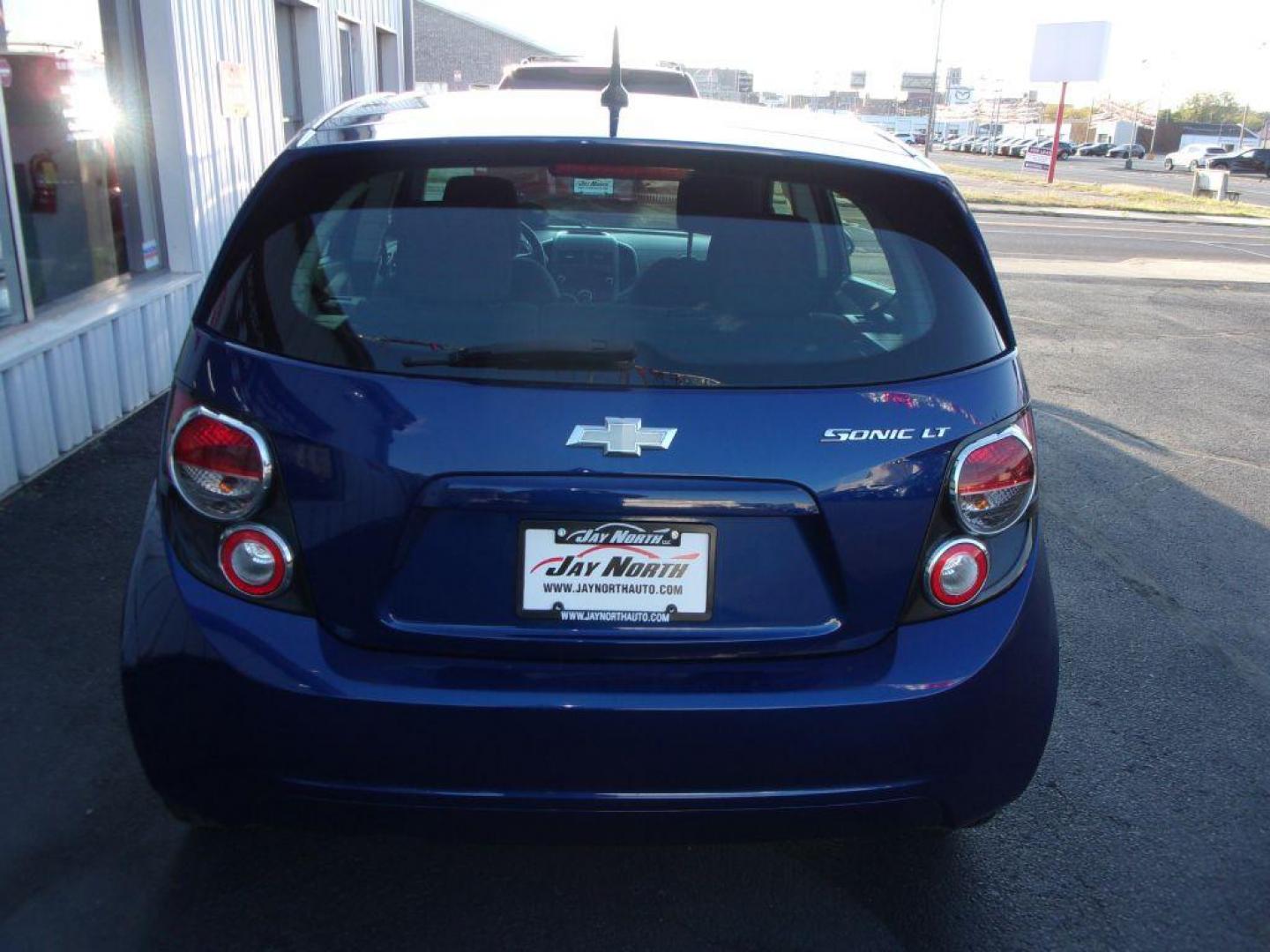 2013 BLUE CHEVROLET SONIC LT (1G1JC6SG2D4) with an 1.8L engine, Automatic transmission, located at 501 E. Columbia St., Springfield, OH, 45503, (800) 262-7122, 39.925262, -83.801796 - *** Serviced and Detailed *** Automatic *** LT *** Gas Saver *** Remote Start *** Jay North Auto has offered hand picked vehicles since 1965! Our customer's enjoy a NO pressure buying experience with a small town feel. All of our vehicles get fully inspected and detailed. We are a preferred dea - Photo#5