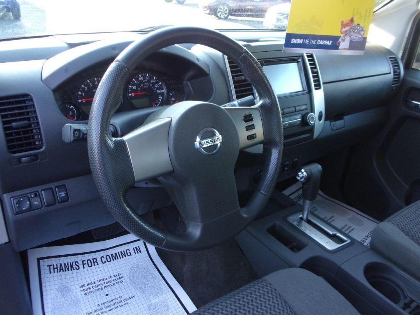 2010 RED NISSAN FRONTIER KING CAB SE (1N6AD0CW1AC) with an 4.0L engine, Automatic transmission, located at 501 E. Columbia St., Springfield, OH, 45503, (800) 262-7122, 39.925262, -83.801796 - *** New Tires *** 4x4 *** Serviced and Detailed *** King Cab *** SE *** 4.0L V6 *** 28 Service Records on Clean CarFax *** Jay North Auto has offered hand picked vehicles since 1965! Our customer's enjoy a NO pressure buying experience with a small town feel. All of our vehicles get fully inspe - Photo#11